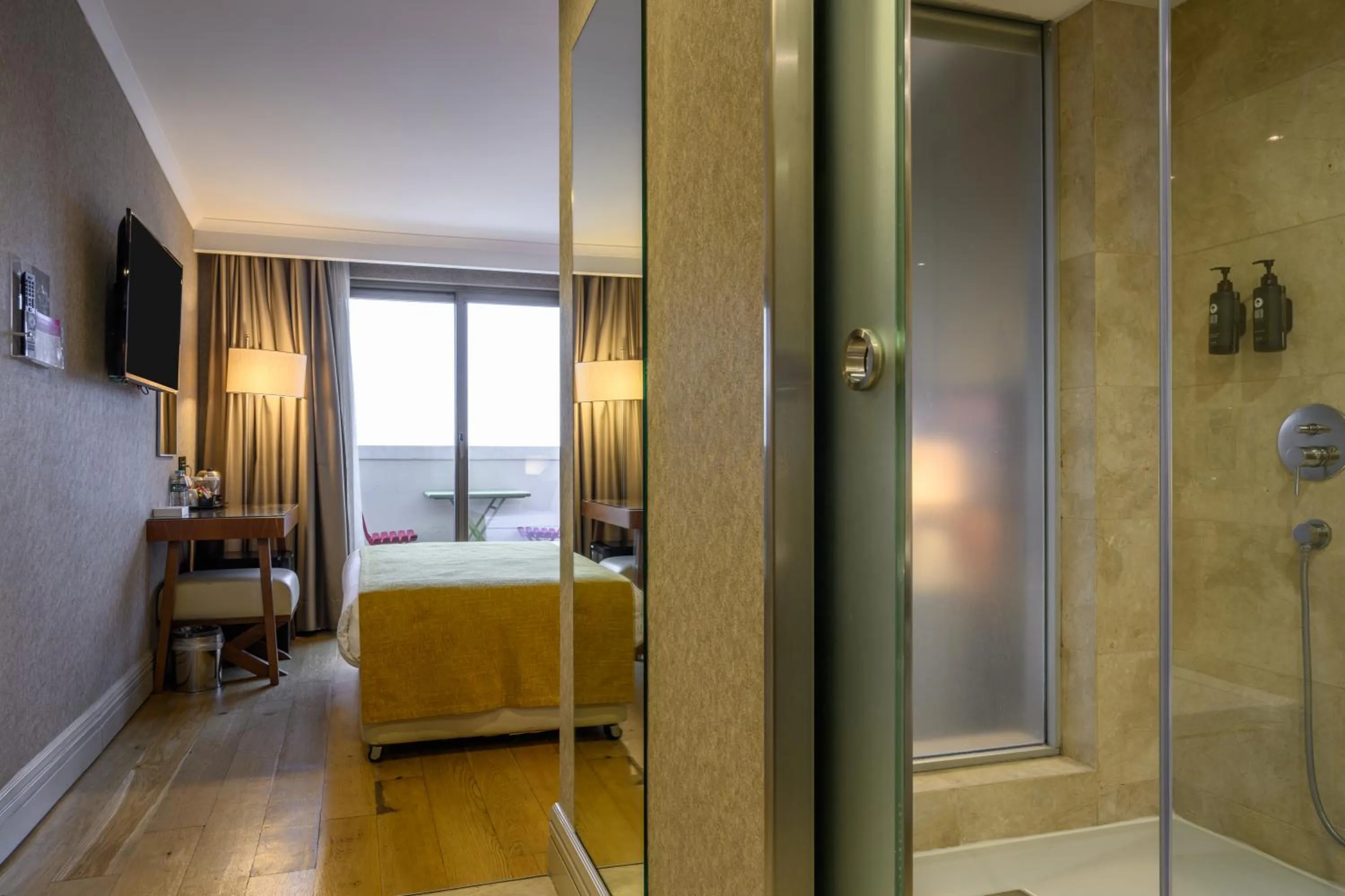 Balcony/Terrace, Bed in Ramada by Wyndham Istanbul Grand Bazaar