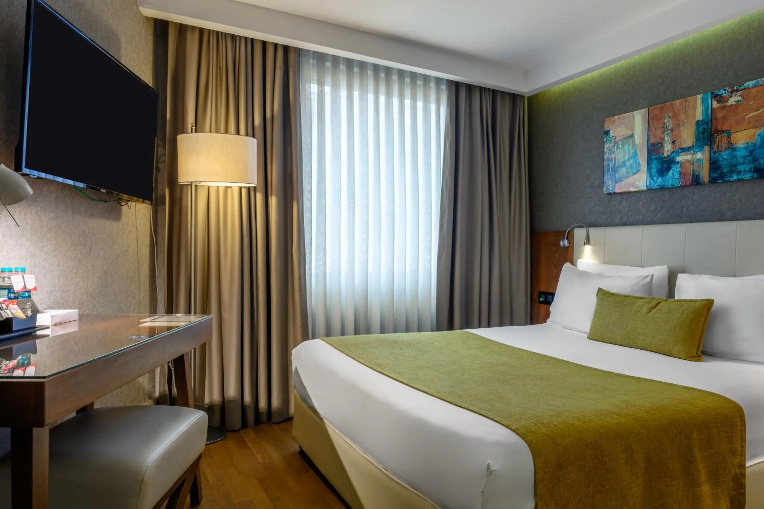 Communal lounge/ TV room, Bed in Ramada by Wyndham Istanbul Grand Bazaar