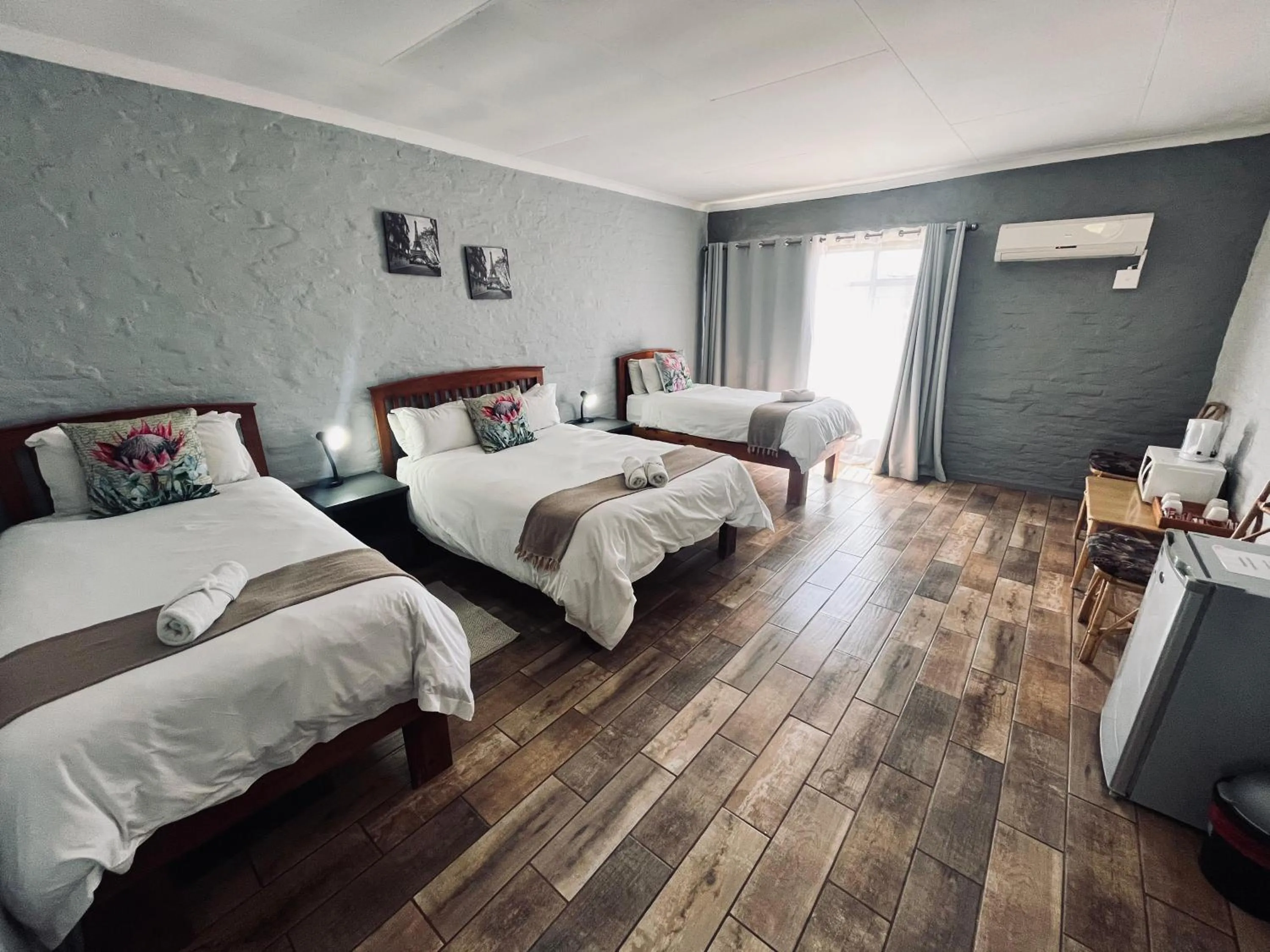 Bed in Merino Inn Hotel