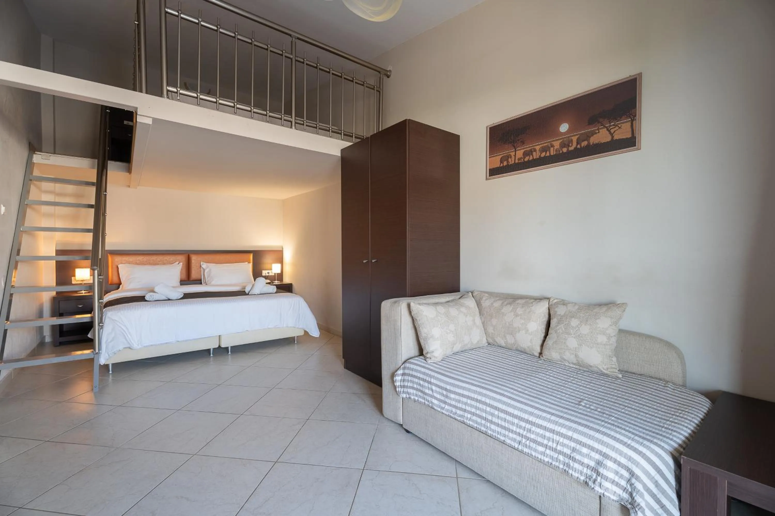 Bed in Meliton Inn Hotel & Suites by the beach