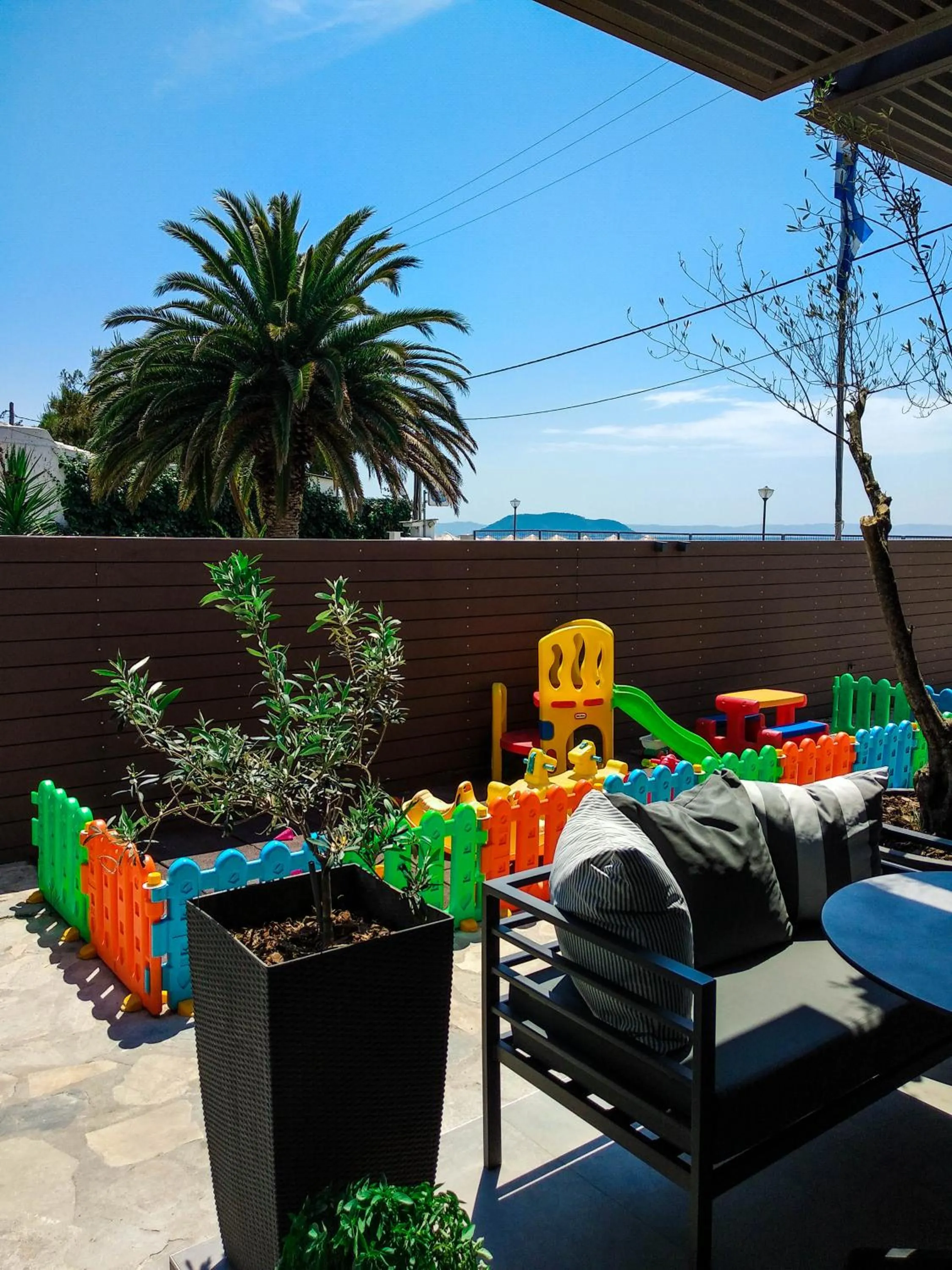 Patio in Meliton Inn Hotel & Suites by the beach