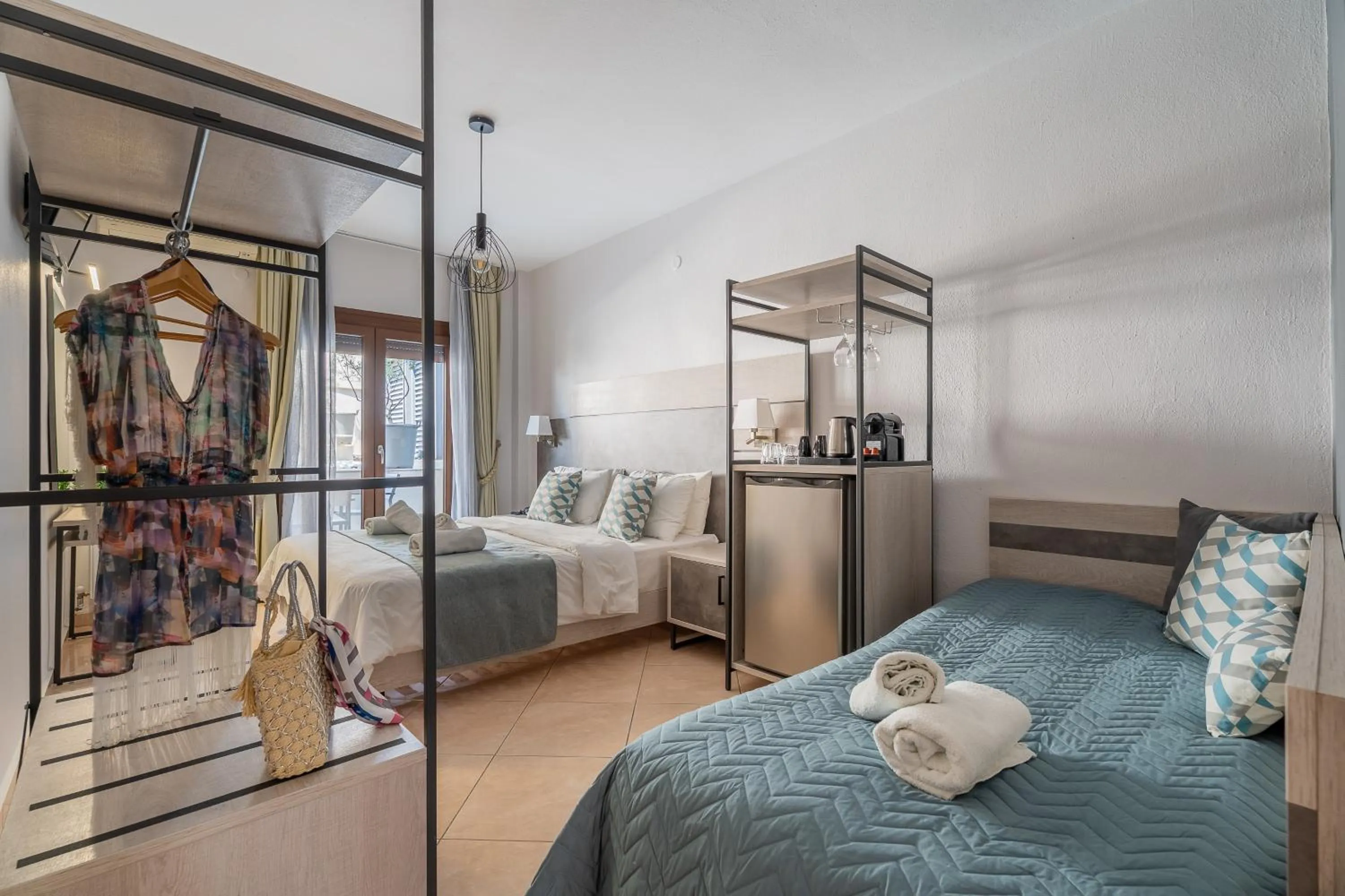 Bed in Meliton Inn Hotel & Suites by the beach