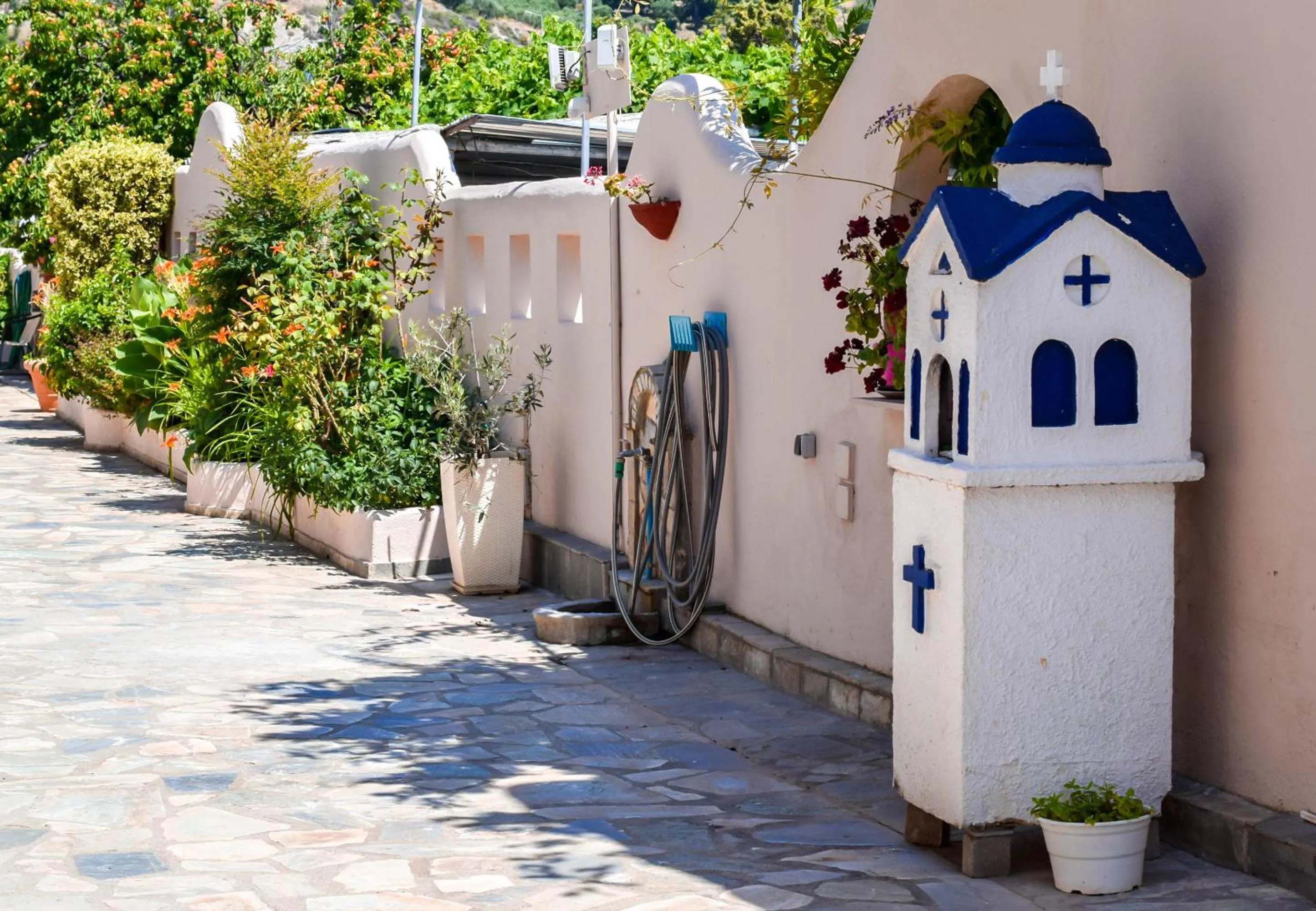 Patio in Meliton Inn Hotel & Suites by the beach