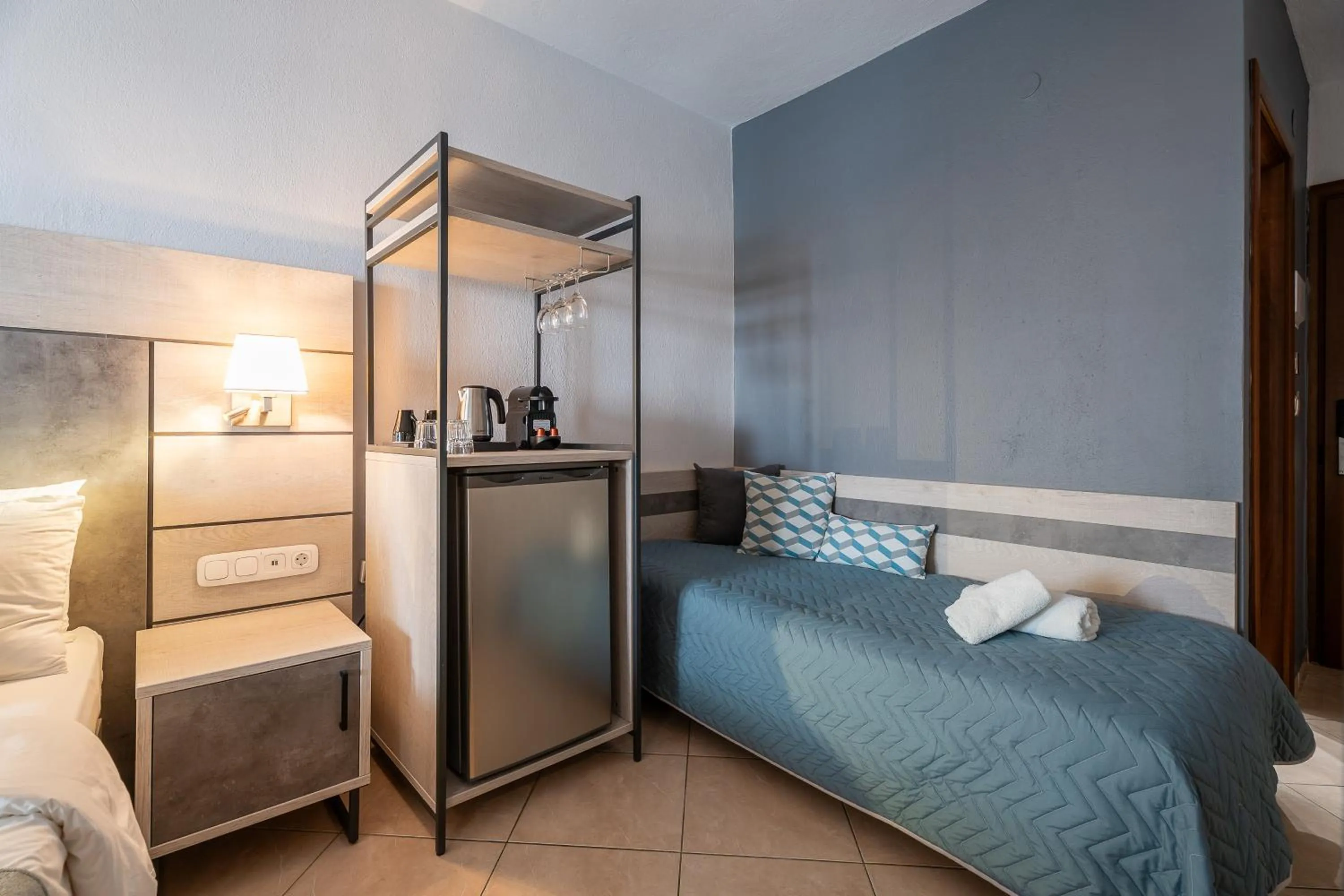 Bed in Meliton Inn Hotel & Suites by the beach