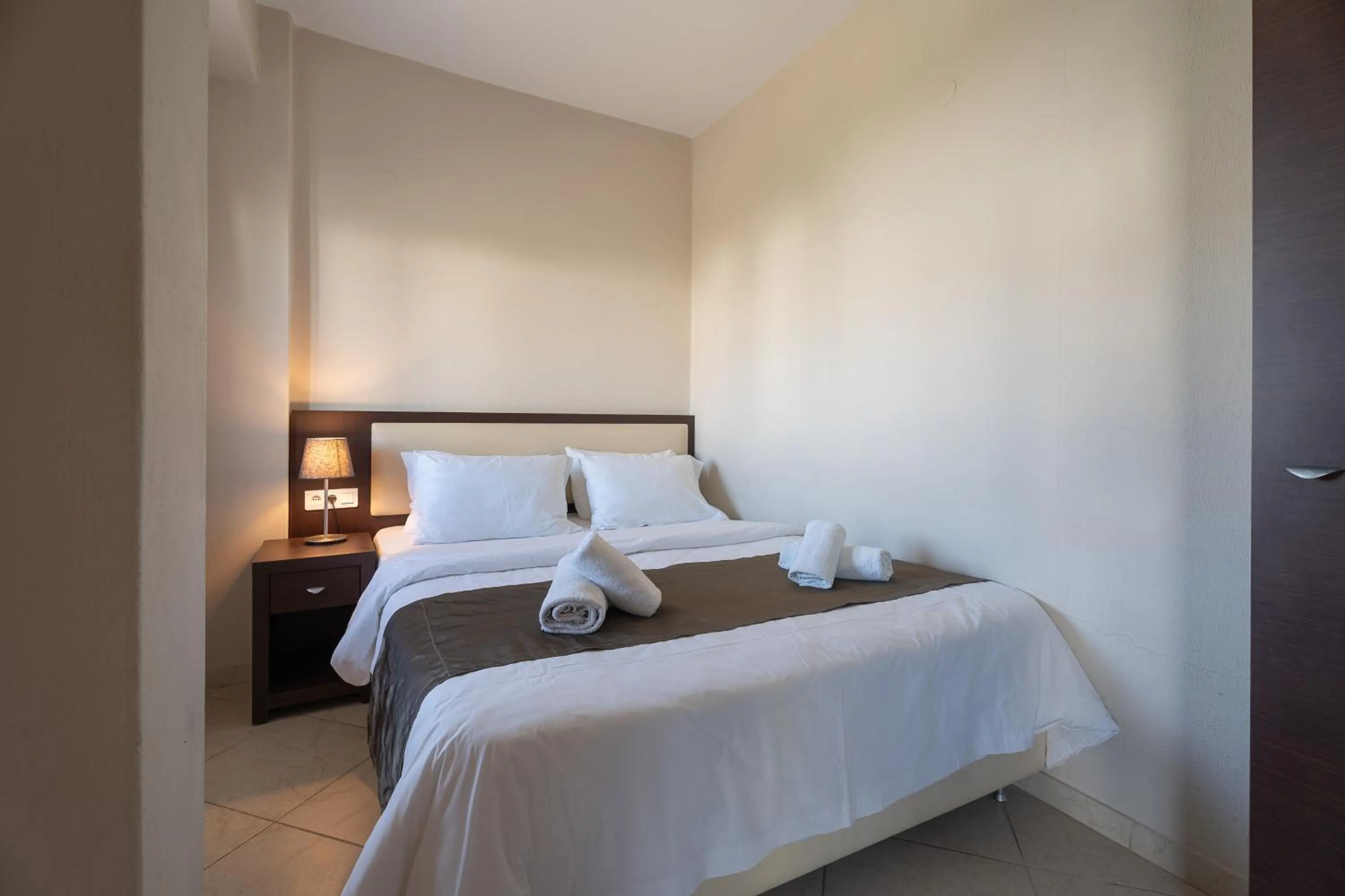 Bed in Meliton Inn Hotel & Suites by the beach