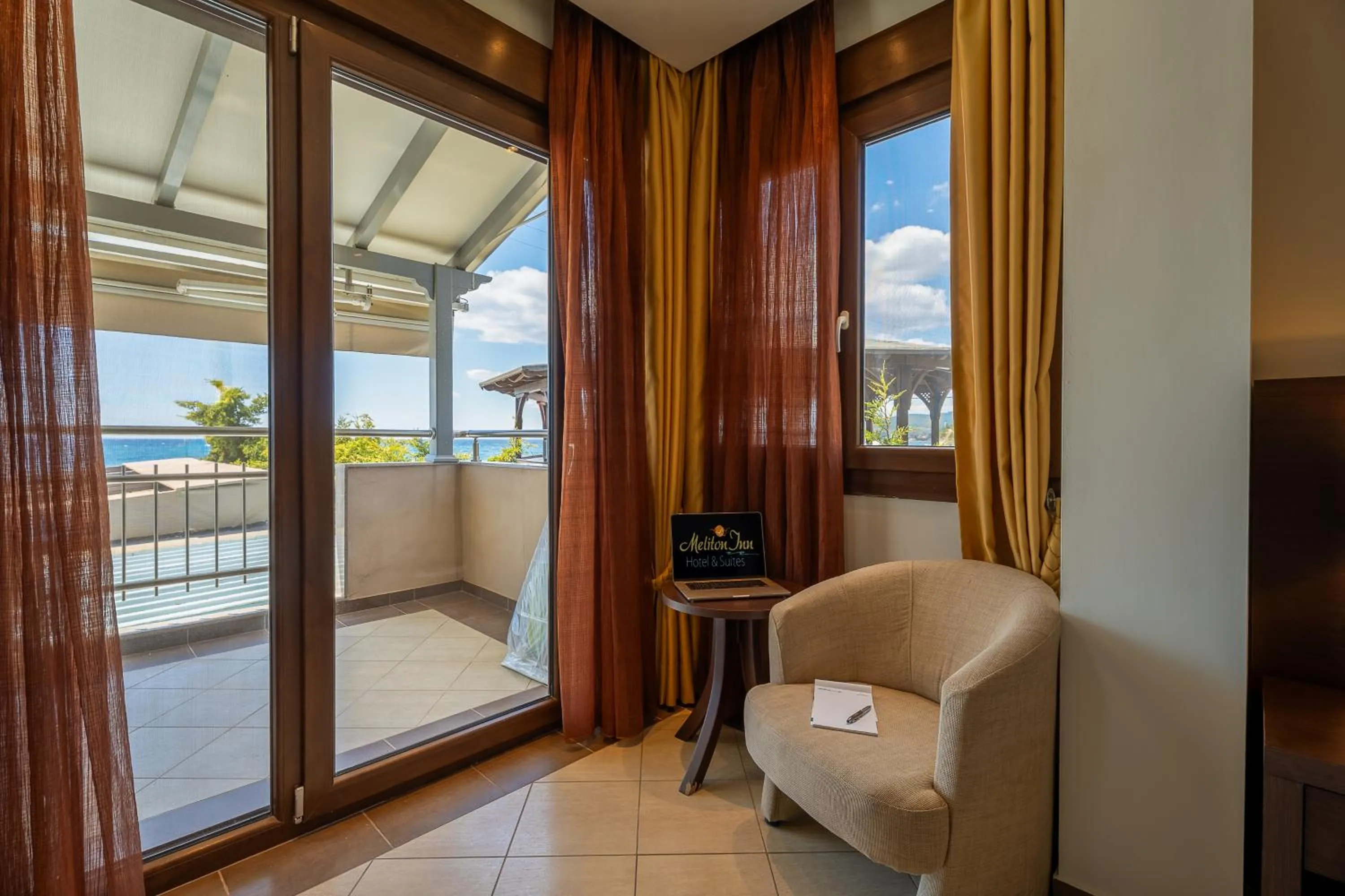 Meliton Inn Hotel & Suites by the beach