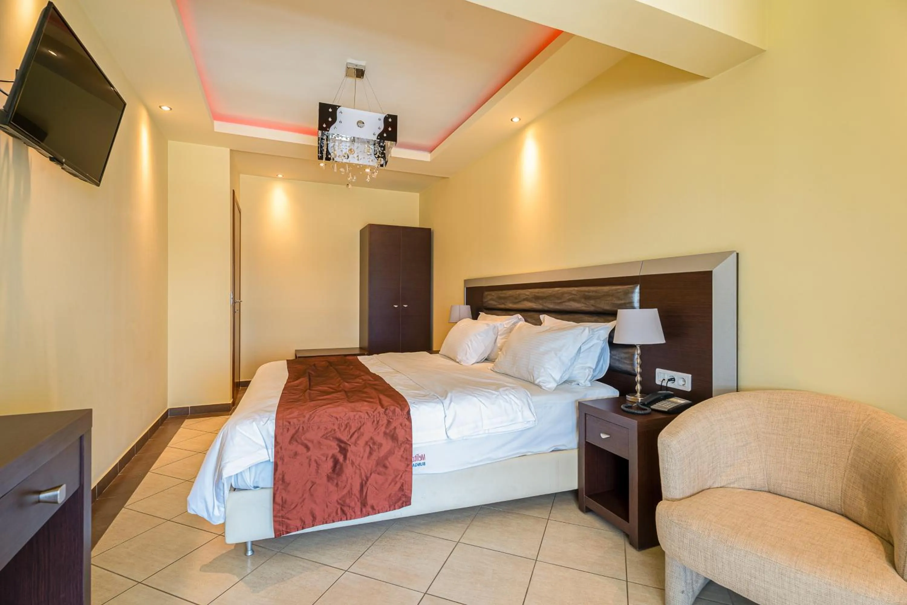 Bed in Meliton Inn Hotel & Suites by the beach