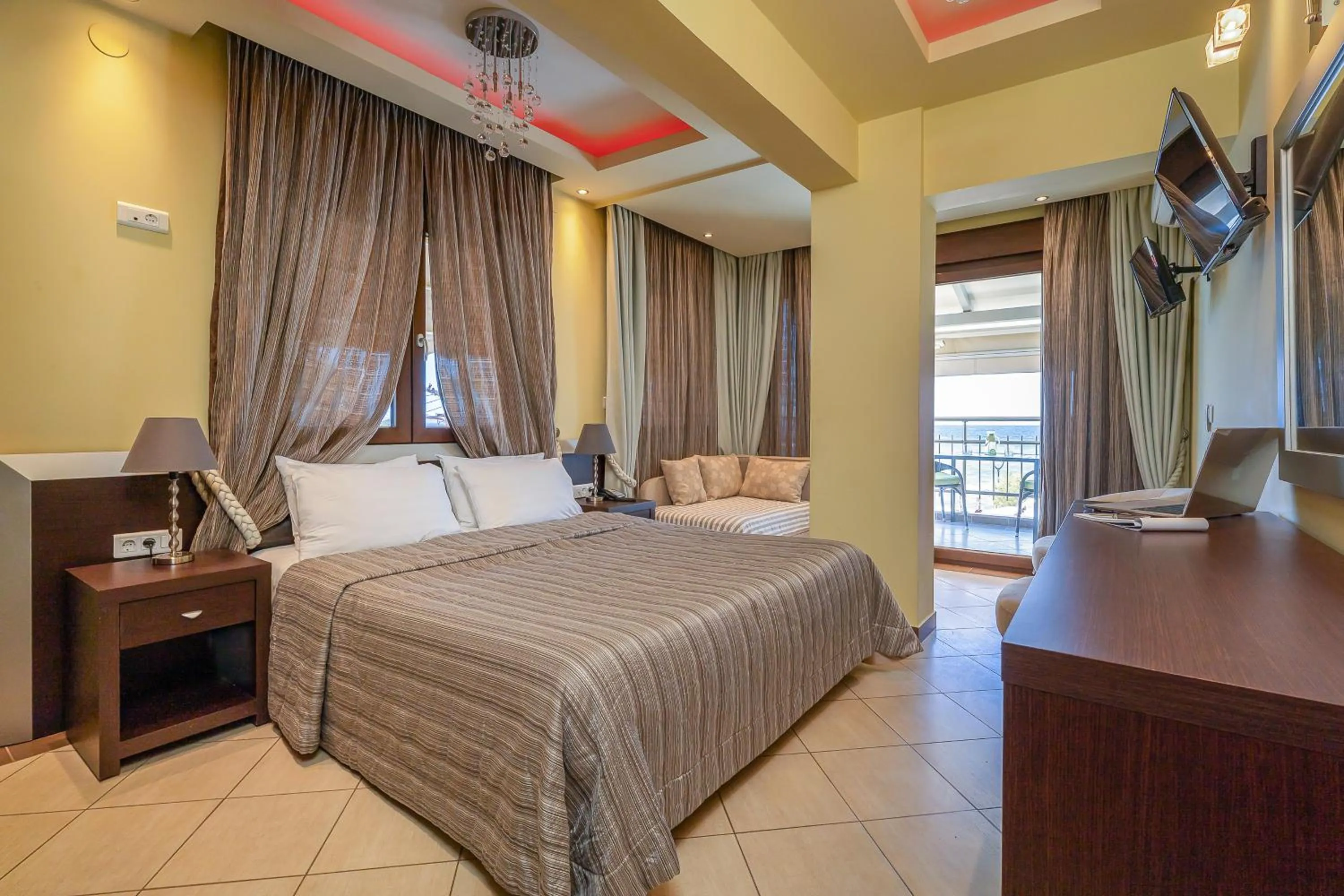 Bed in Meliton Inn Hotel & Suites by the beach