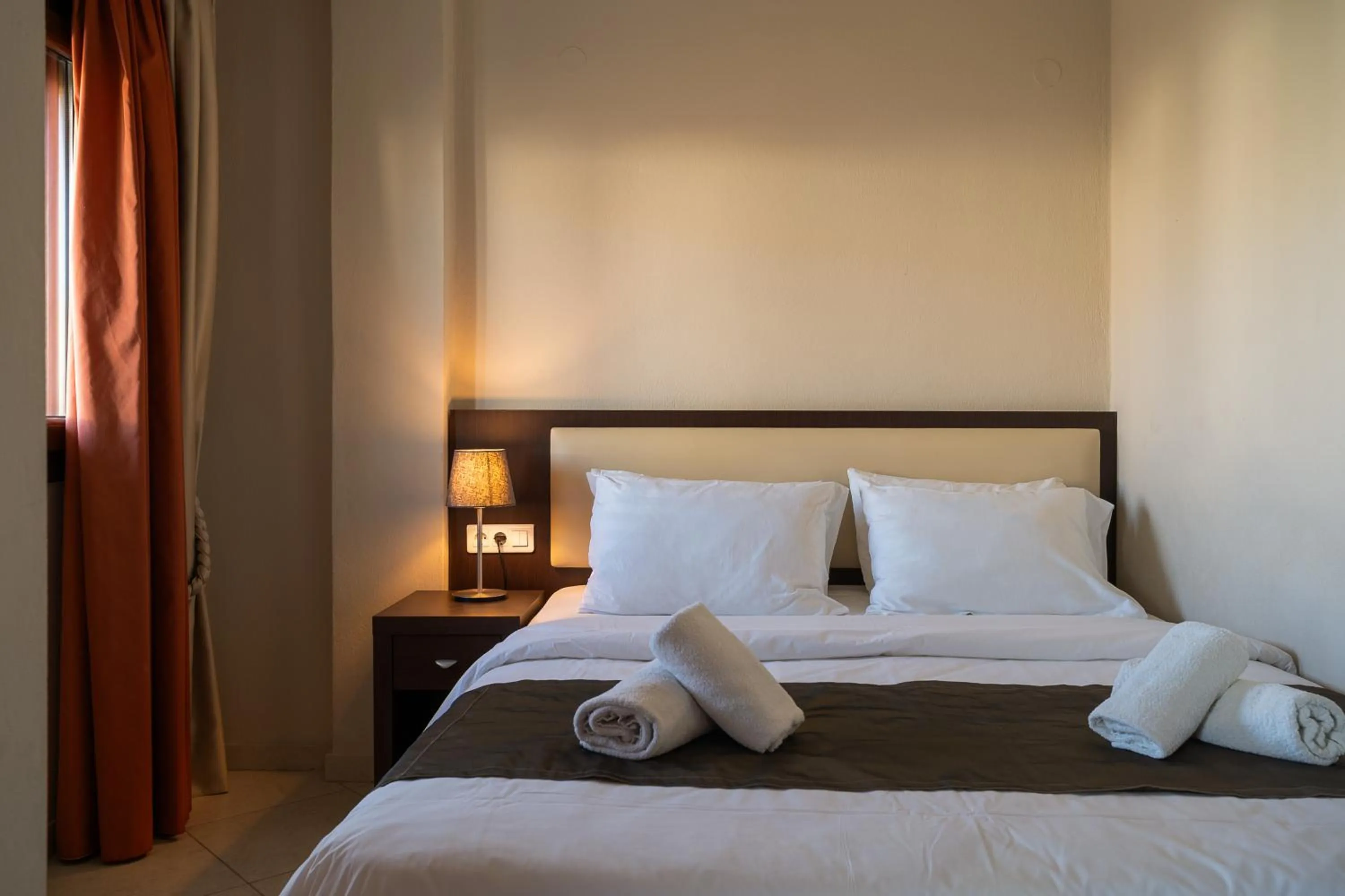 Bed in Meliton Inn Hotel & Suites by the beach