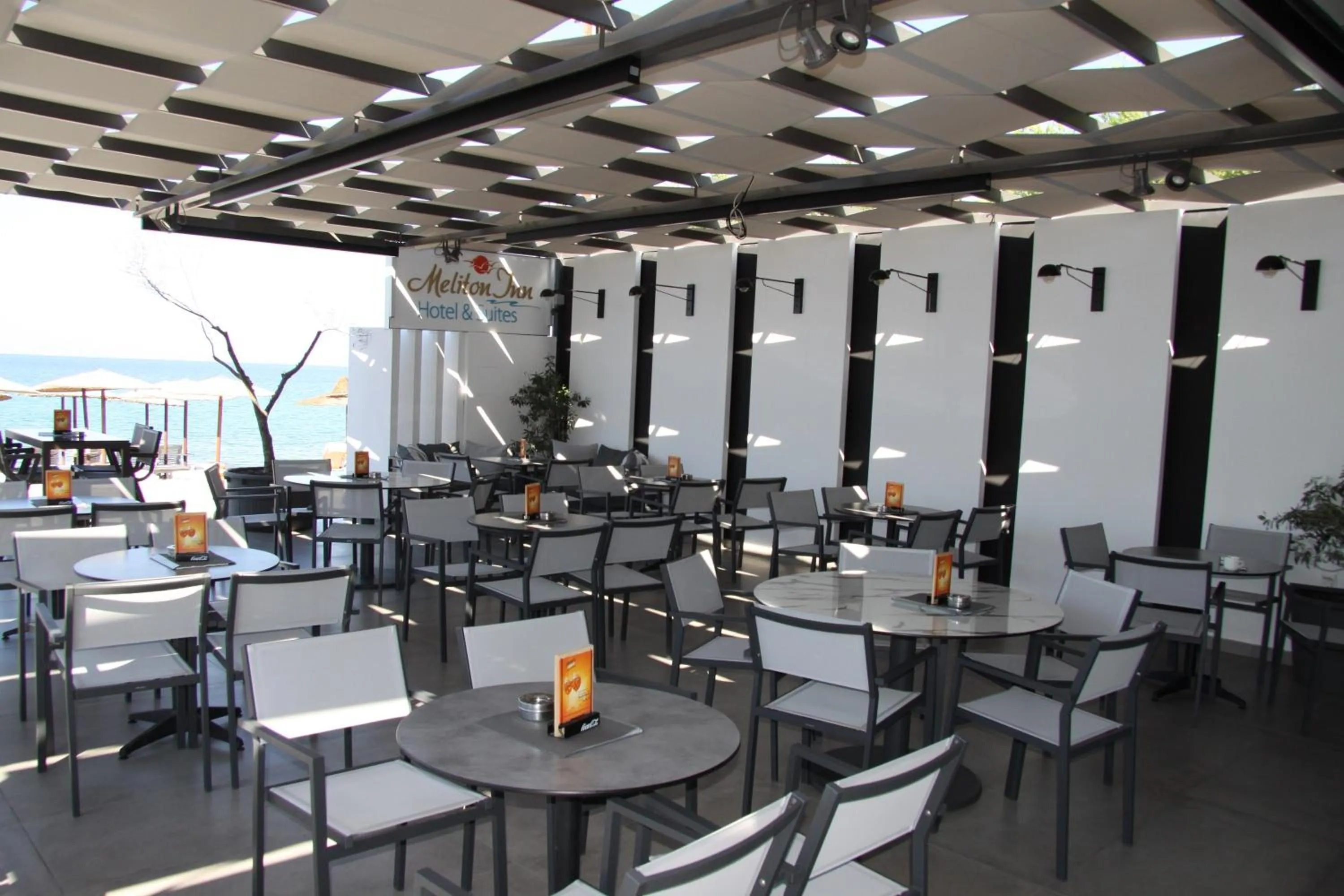 Lounge or bar in Meliton Inn Hotel & Suites by the beach