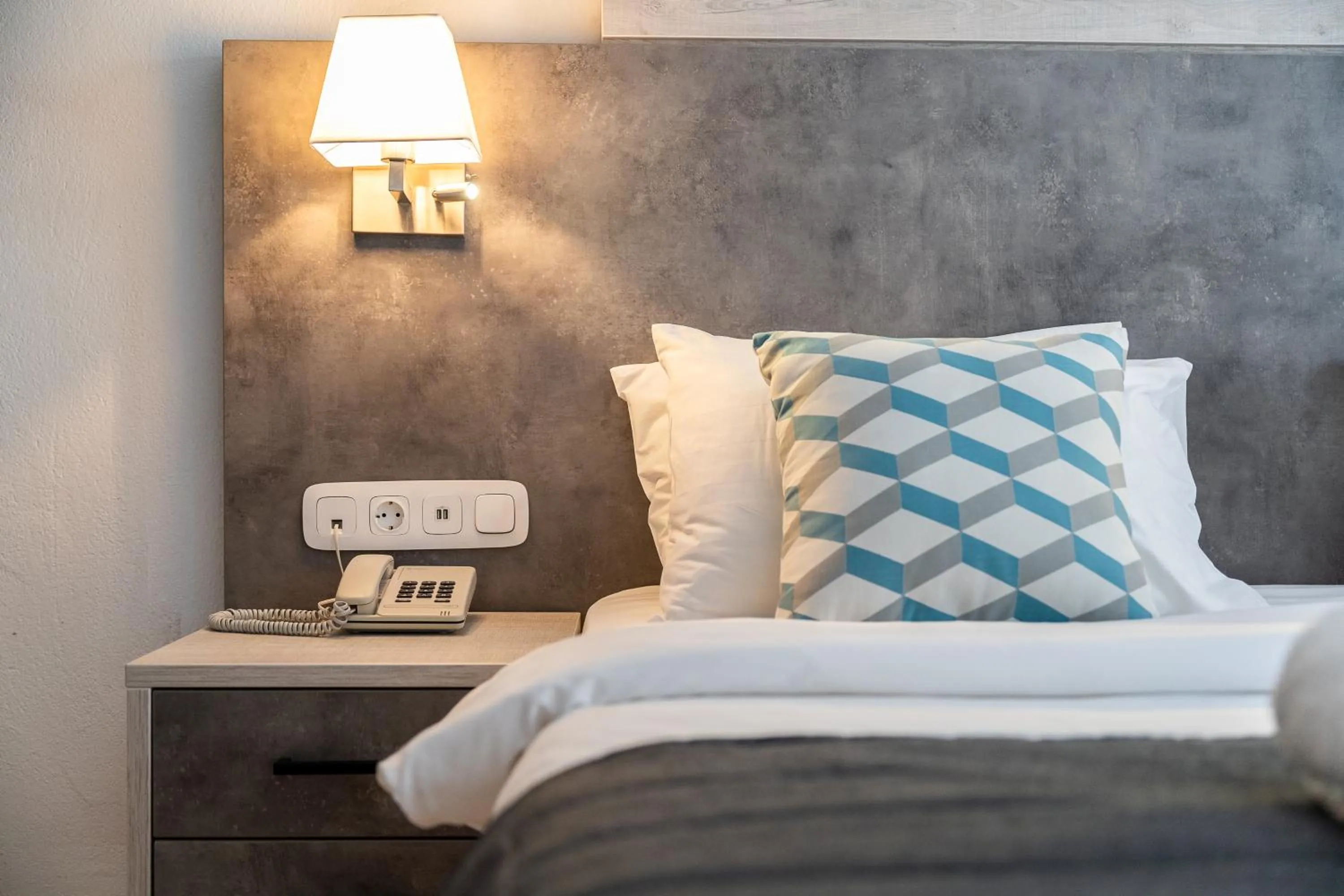 Bed in Meliton Inn Hotel & Suites by the beach