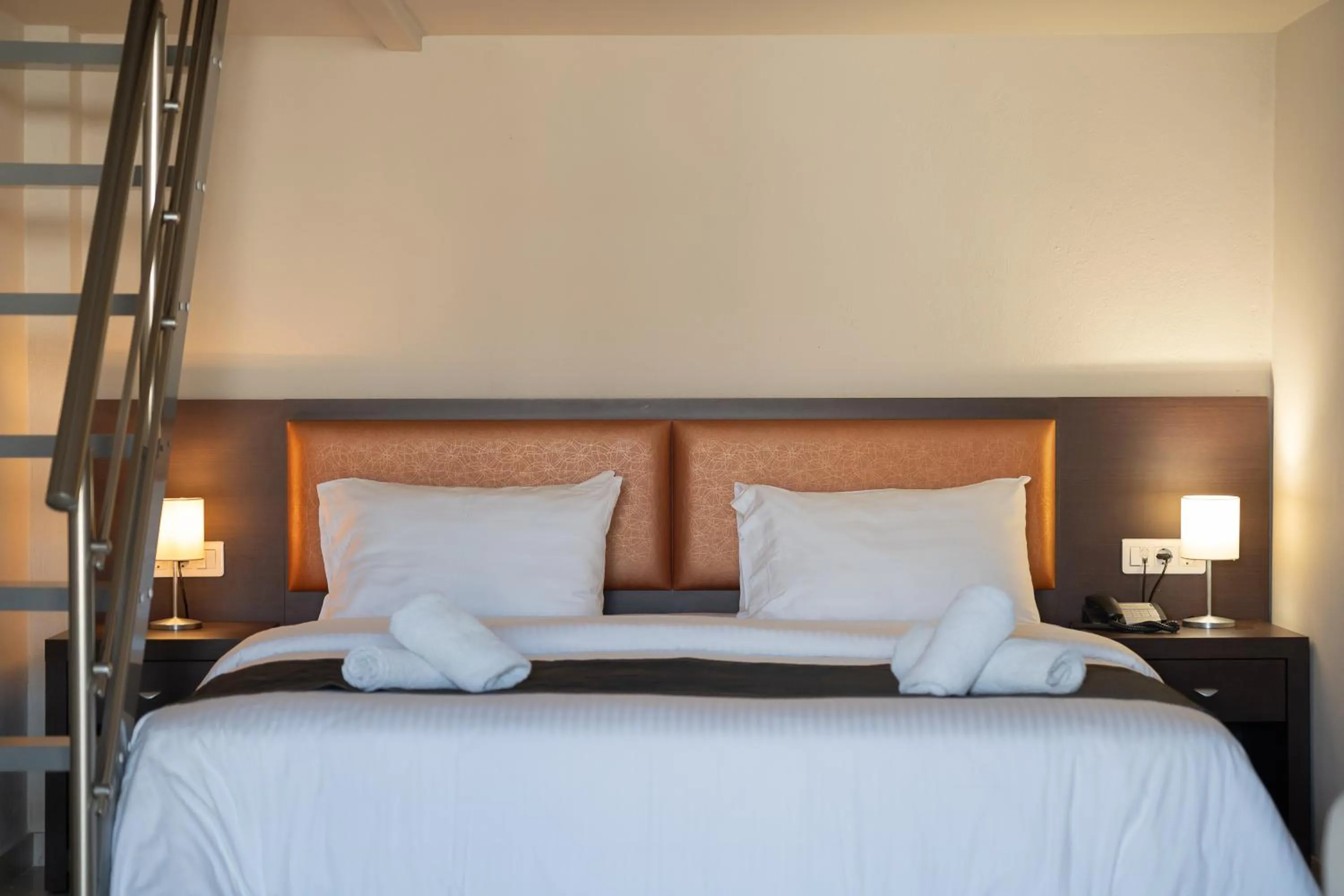 Bed in Meliton Inn Hotel & Suites by the beach