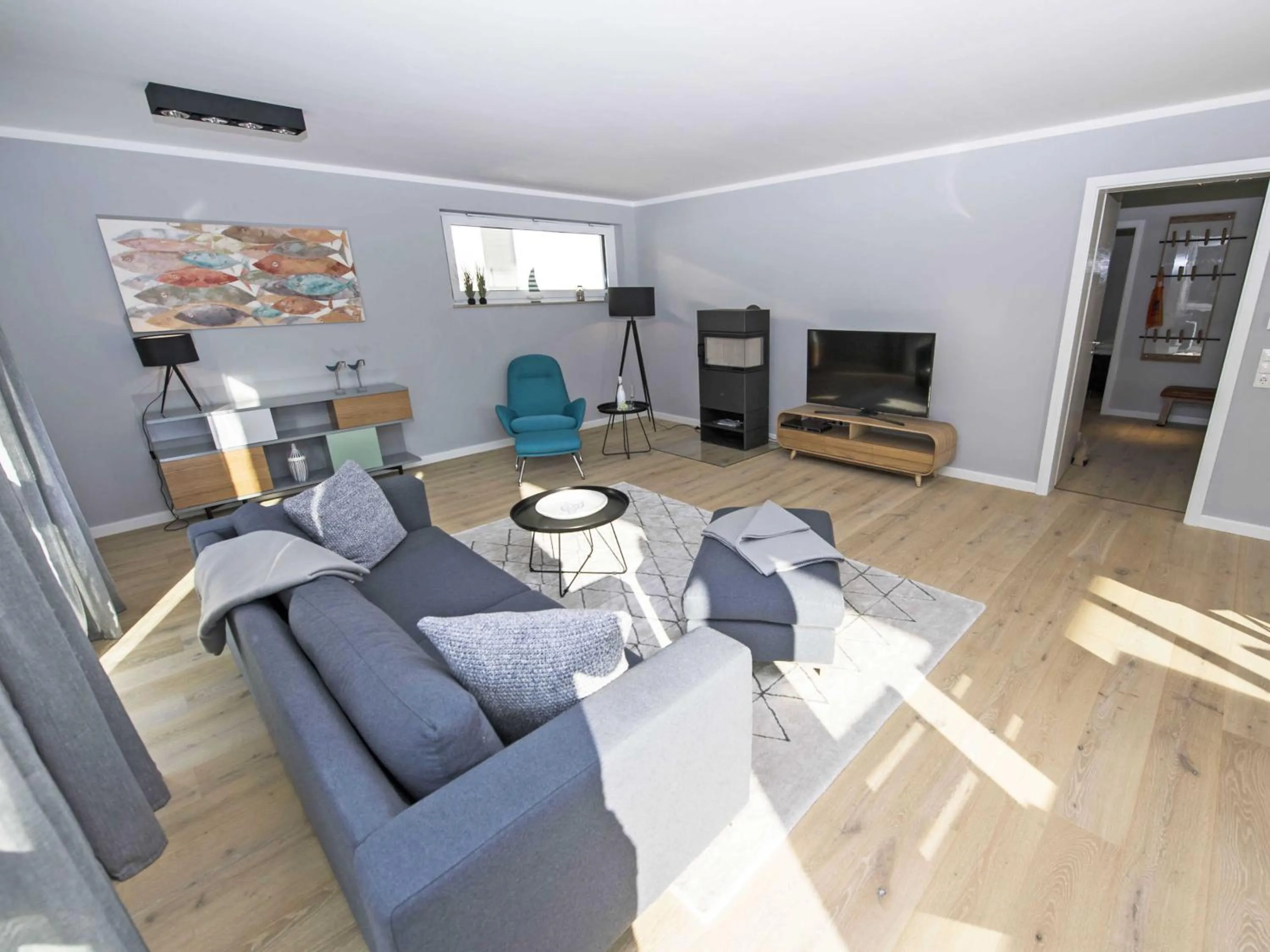 Communal lounge/ TV room in Haus Königsstuhl in Sellin - Penthouse mit Kamin und Balkon