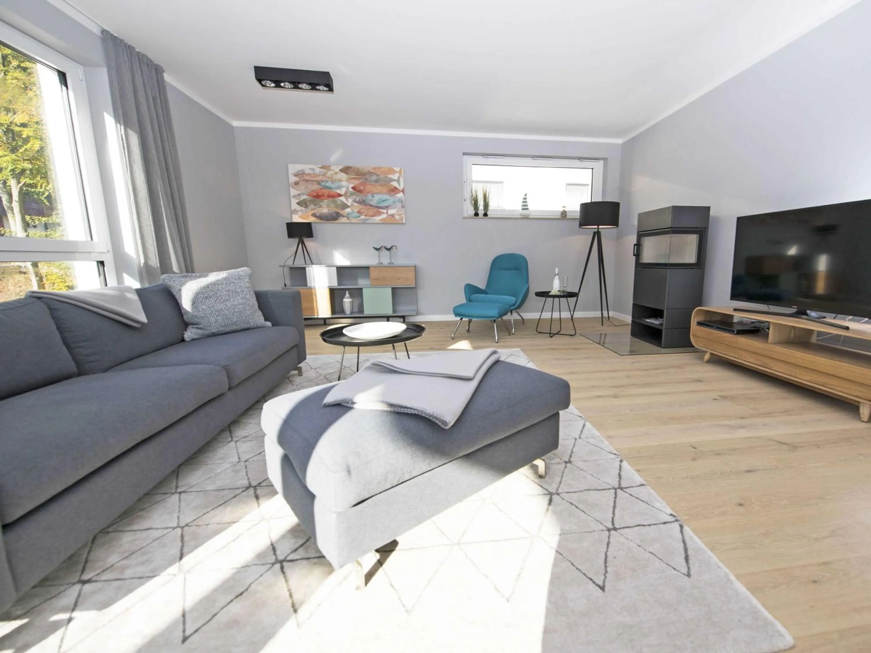 Communal lounge/ TV room in Haus Königsstuhl in Sellin - Penthouse mit Kamin und Balkon