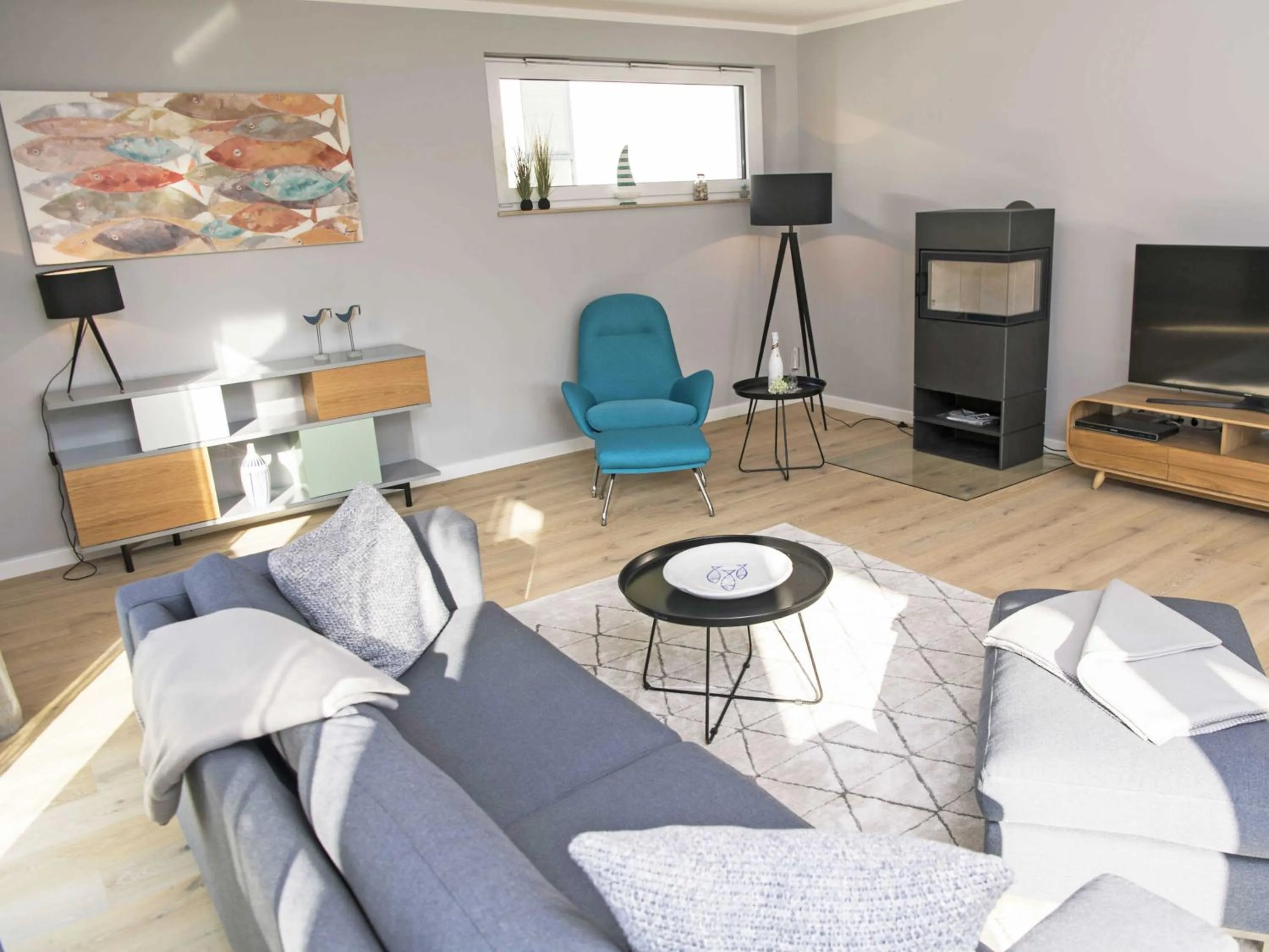 Communal lounge/ TV room in Haus Königsstuhl in Sellin - Penthouse mit Kamin und Balkon