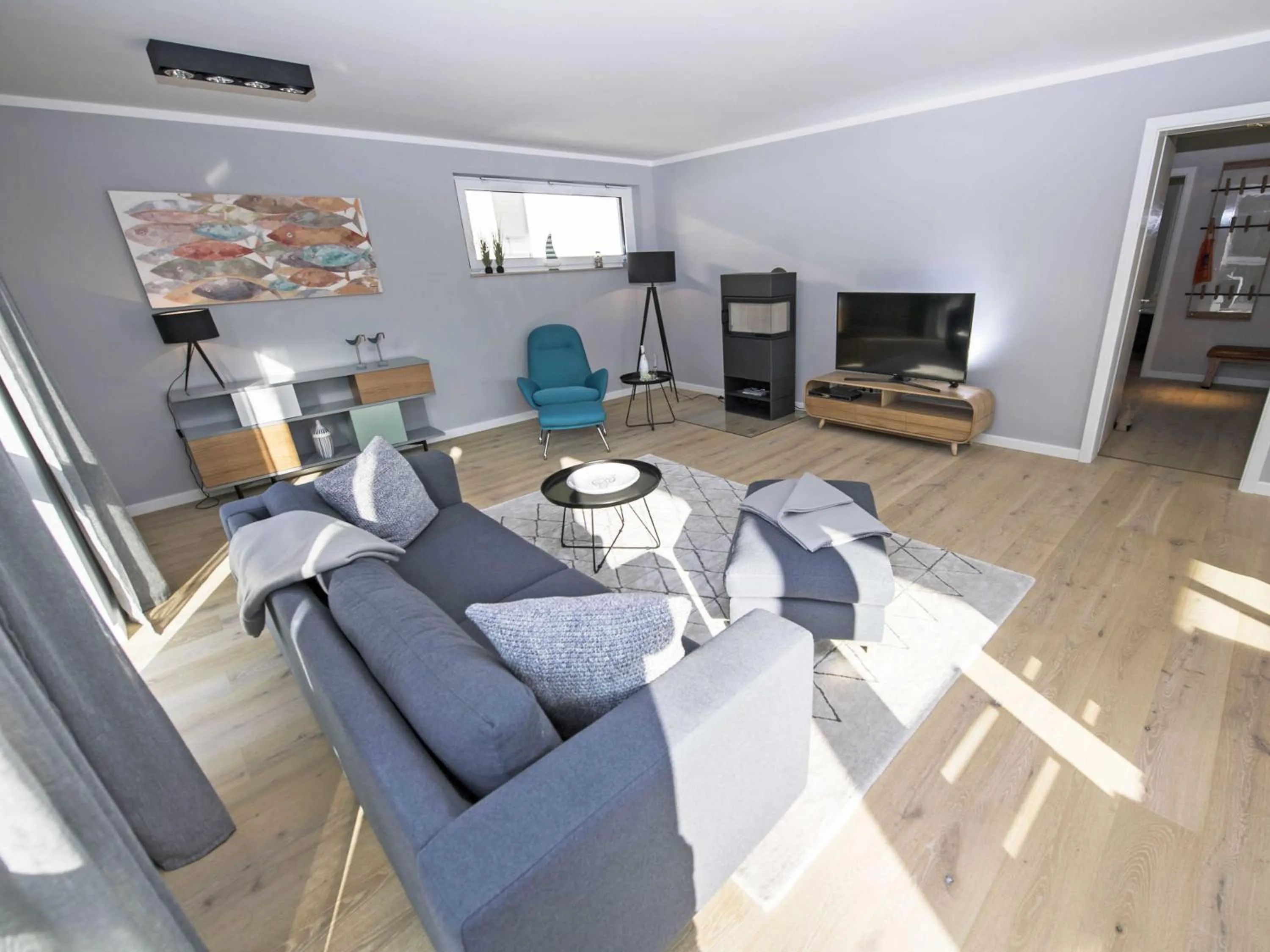 Communal lounge/ TV room in Haus Königsstuhl in Sellin - Penthouse mit Kamin und Balkon