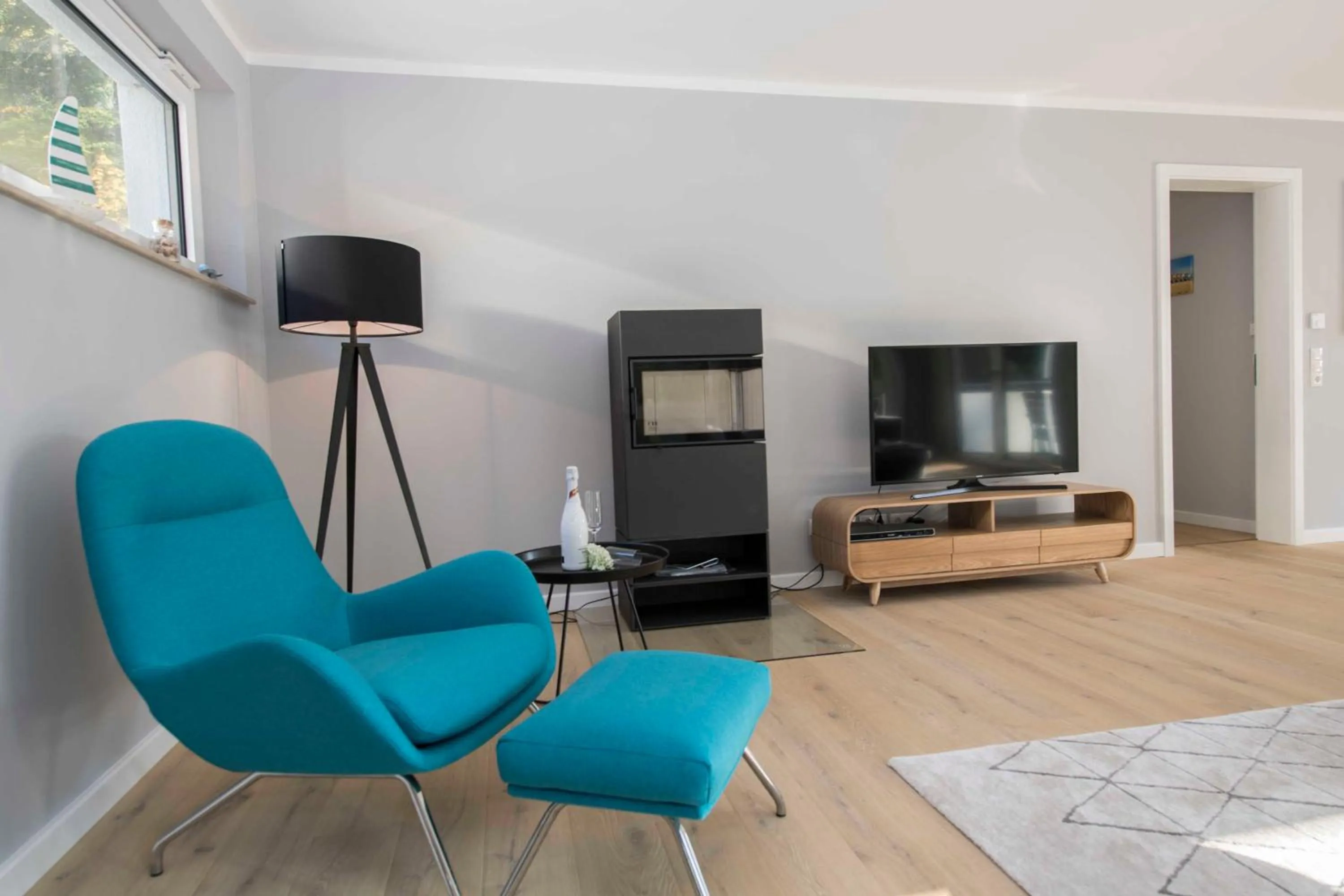 Communal lounge/ TV room in Haus Königsstuhl in Sellin - Penthouse mit Kamin und Balkon