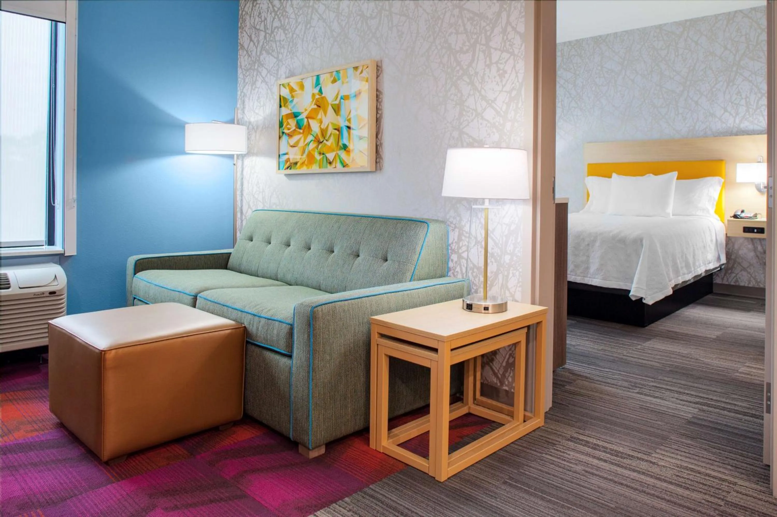 Living room, Bed in Home2 Suites By Hilton Lake Charles