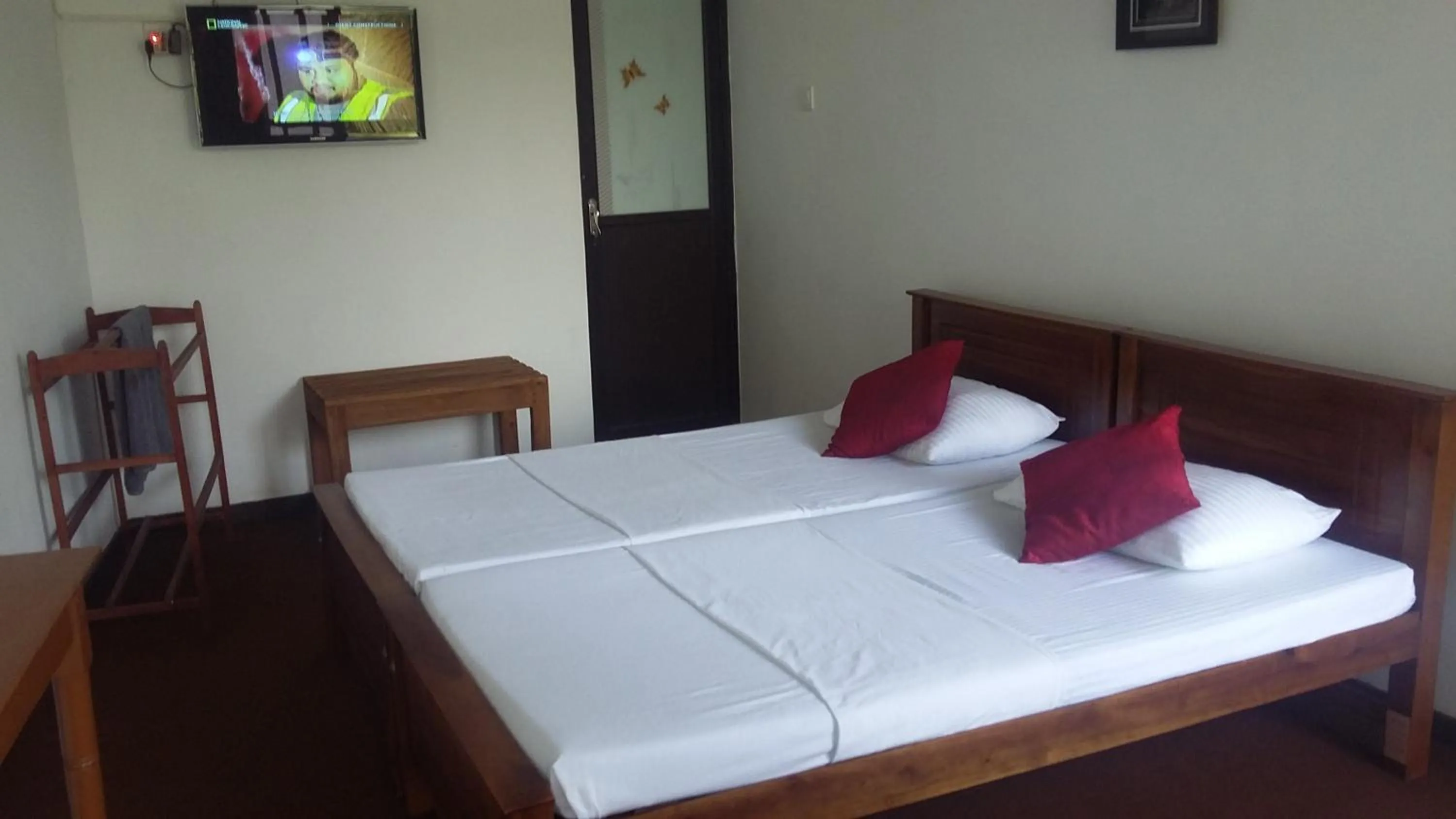 Bed in Kandy Mountain Cottage