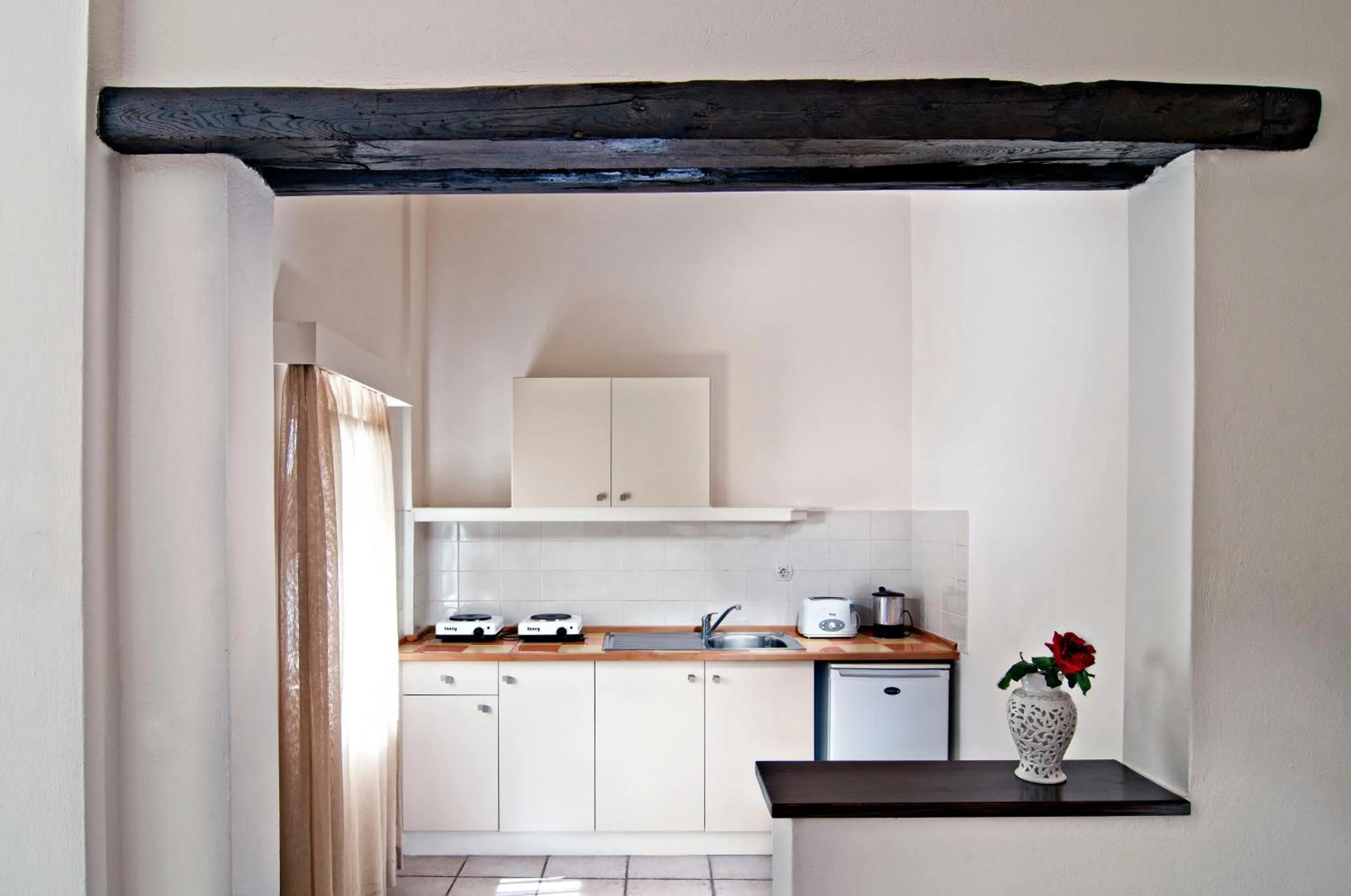 Kitchen or kitchenette in Ourania Apartments Hotel