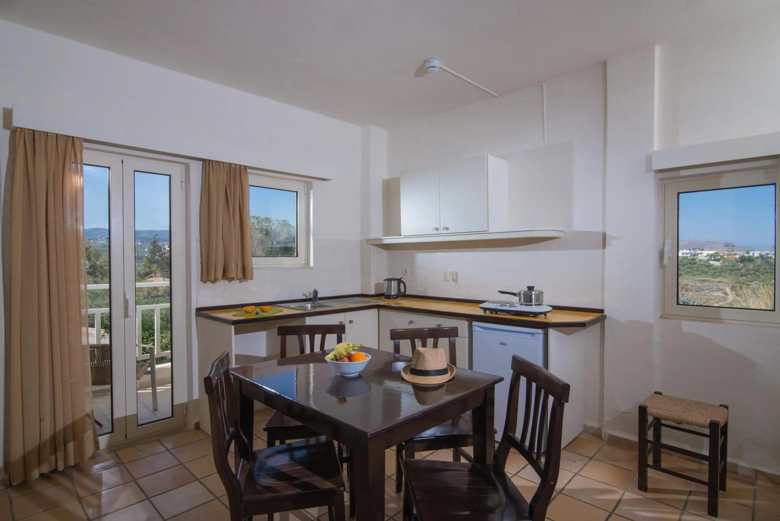 Kitchen or kitchenette in Ourania Apartments Hotel
