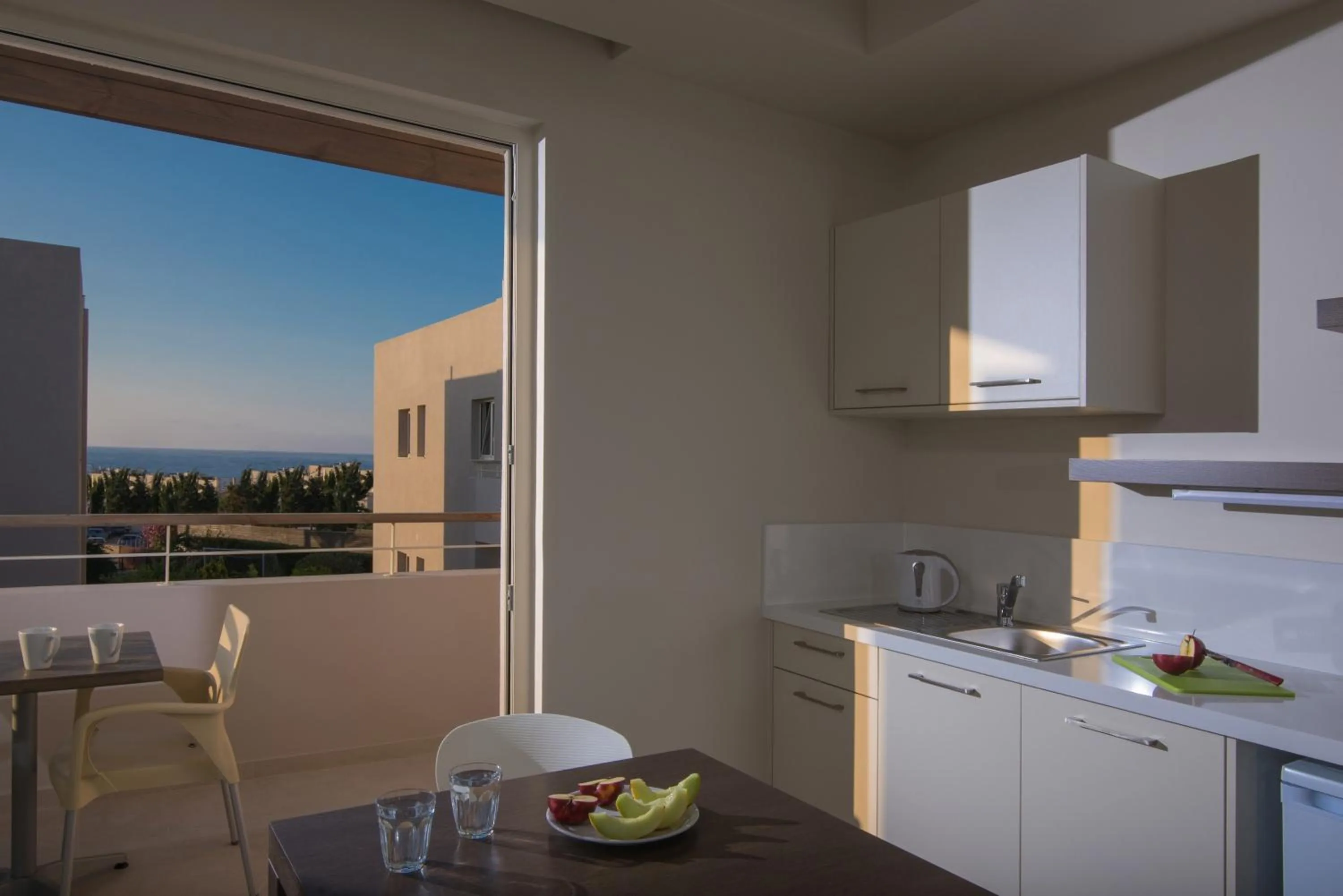 Kitchen or kitchenette in Ourania Apartments Hotel