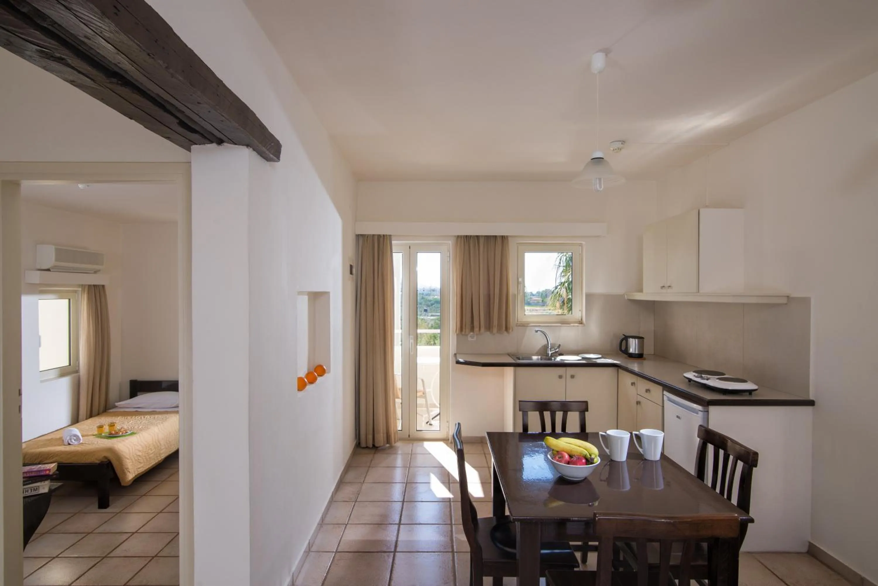 Kitchen or kitchenette in Ourania Apartments Hotel
