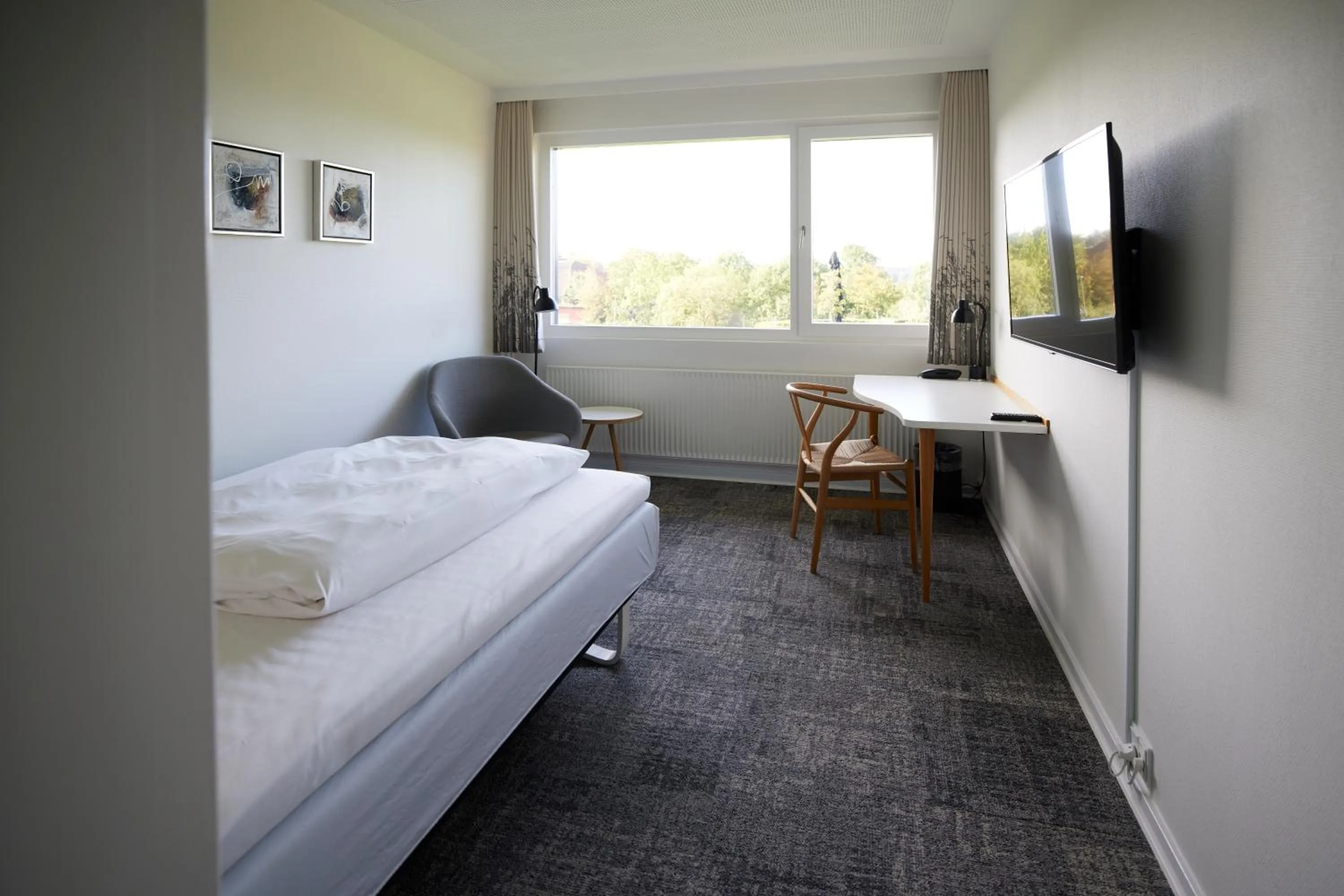 Bedroom, Bed in Trinity Hotel og Konference