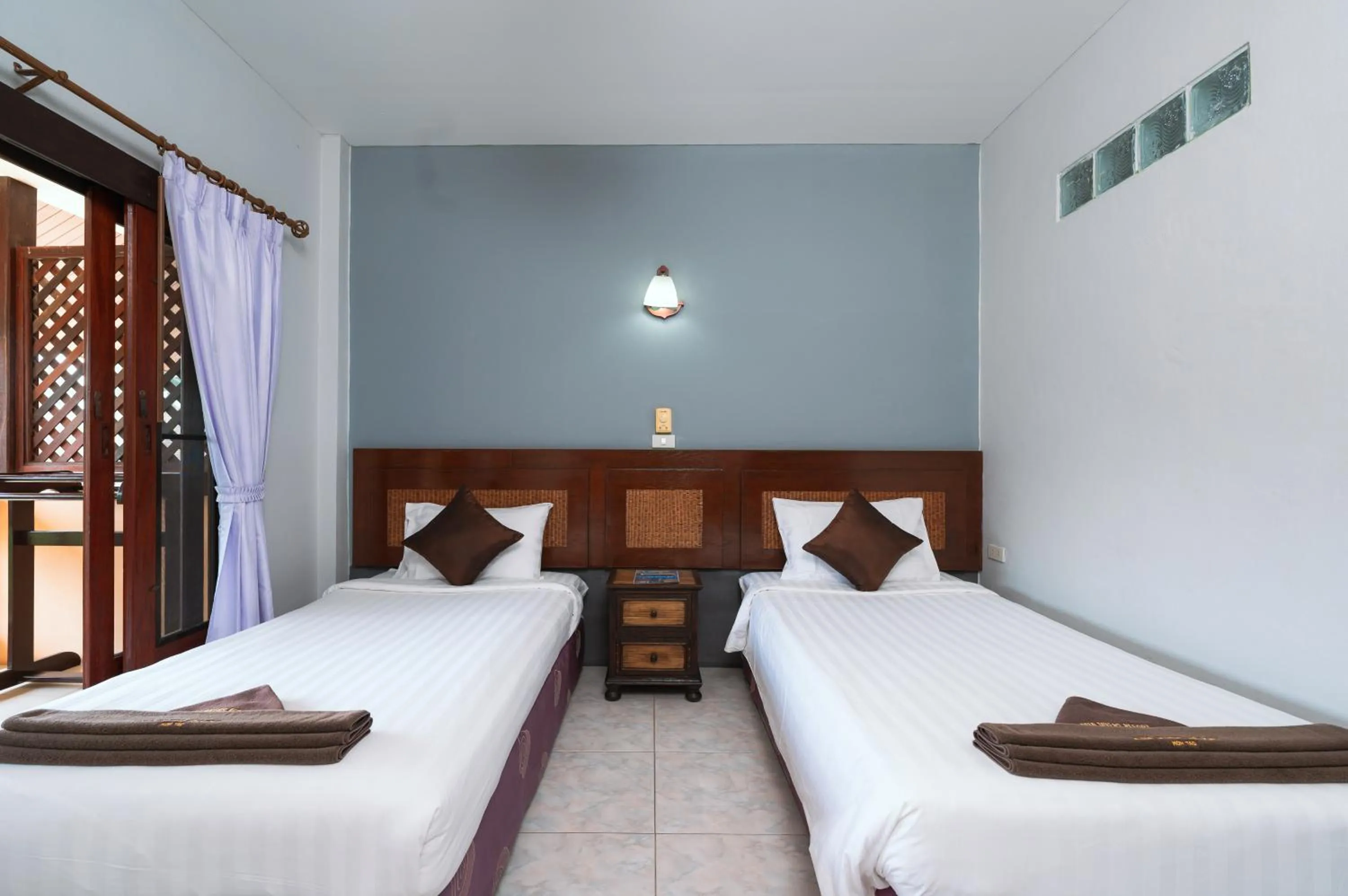 Bed in Asia Divers Resort