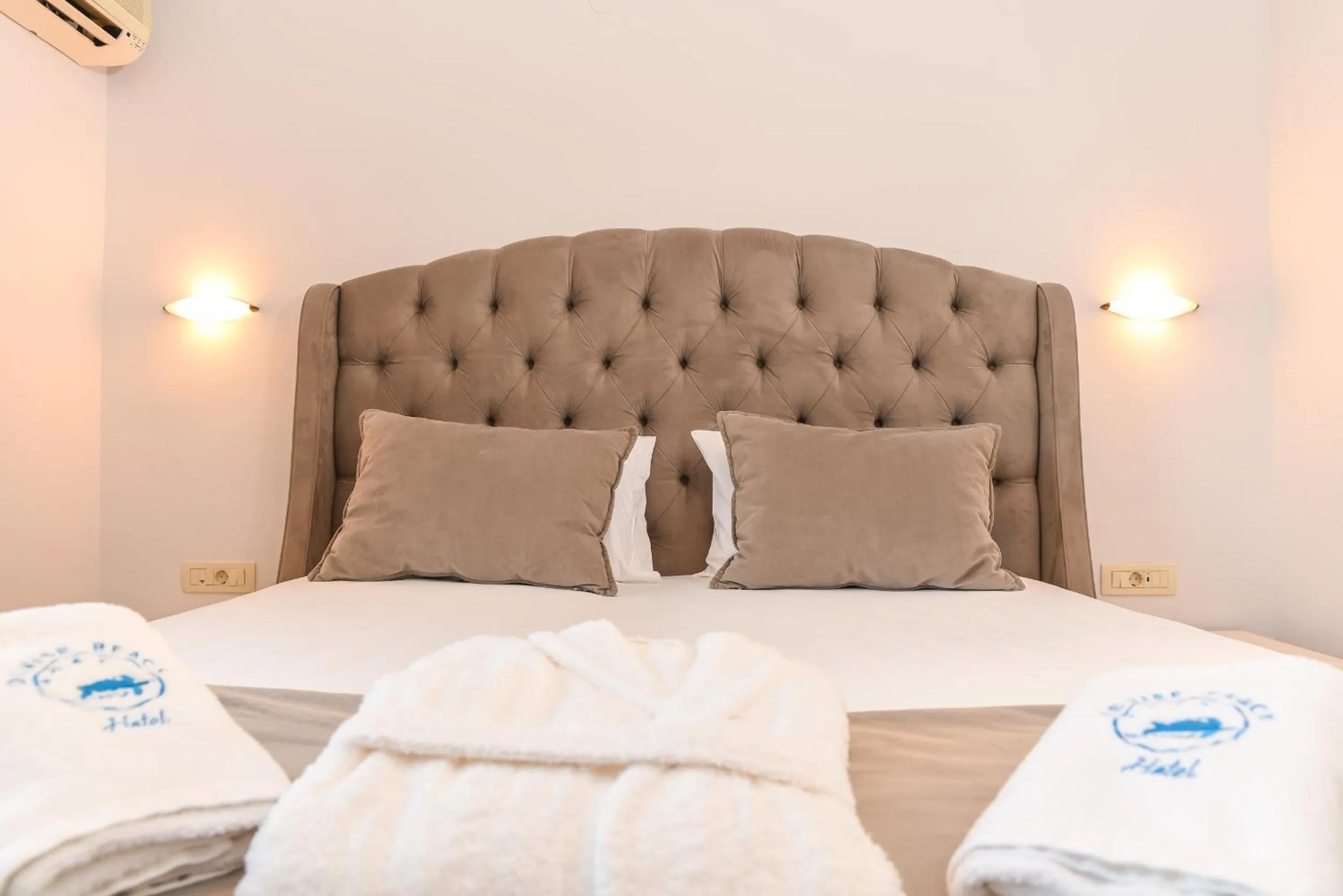 Bed in Denise Beach Hotel