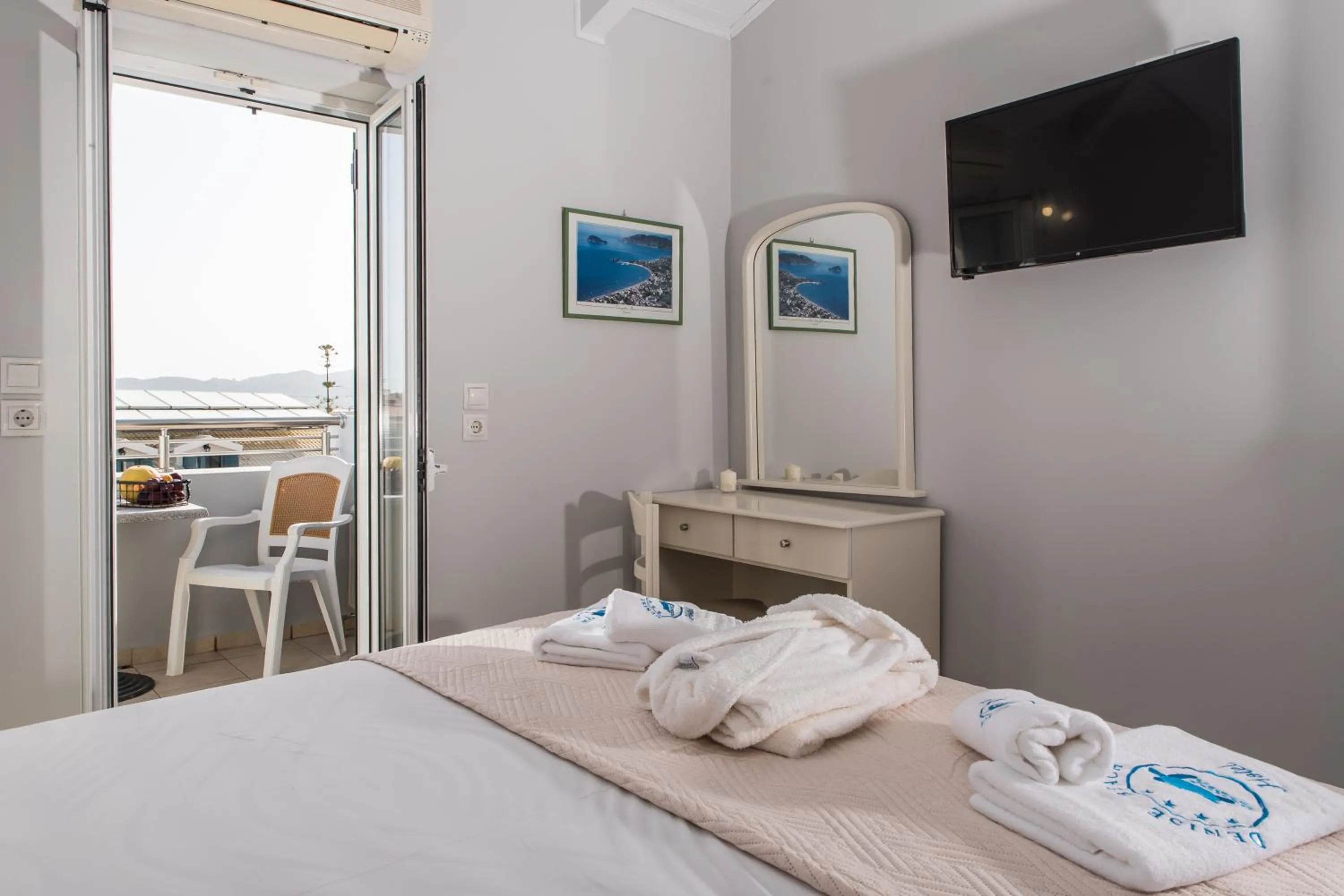 Bed in Denise Beach Hotel