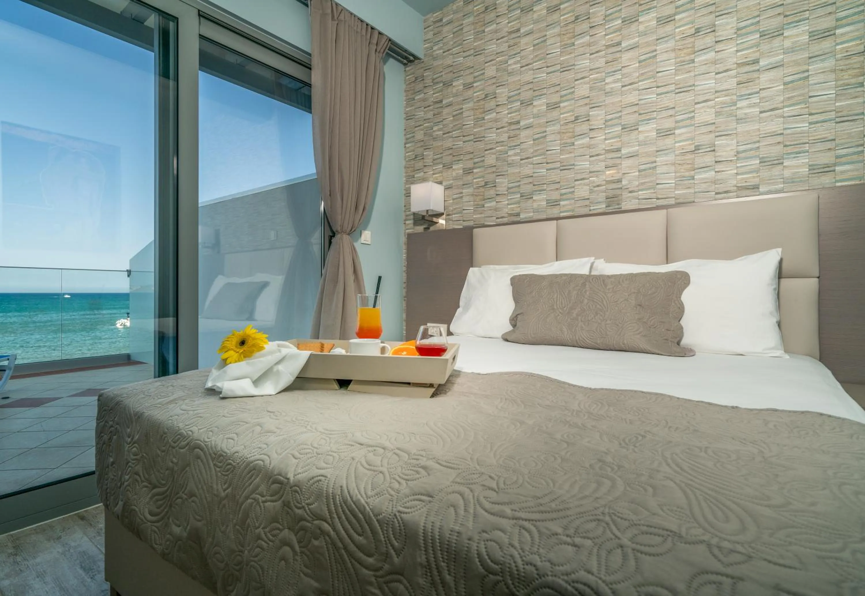 Bed in Denise Beach Hotel