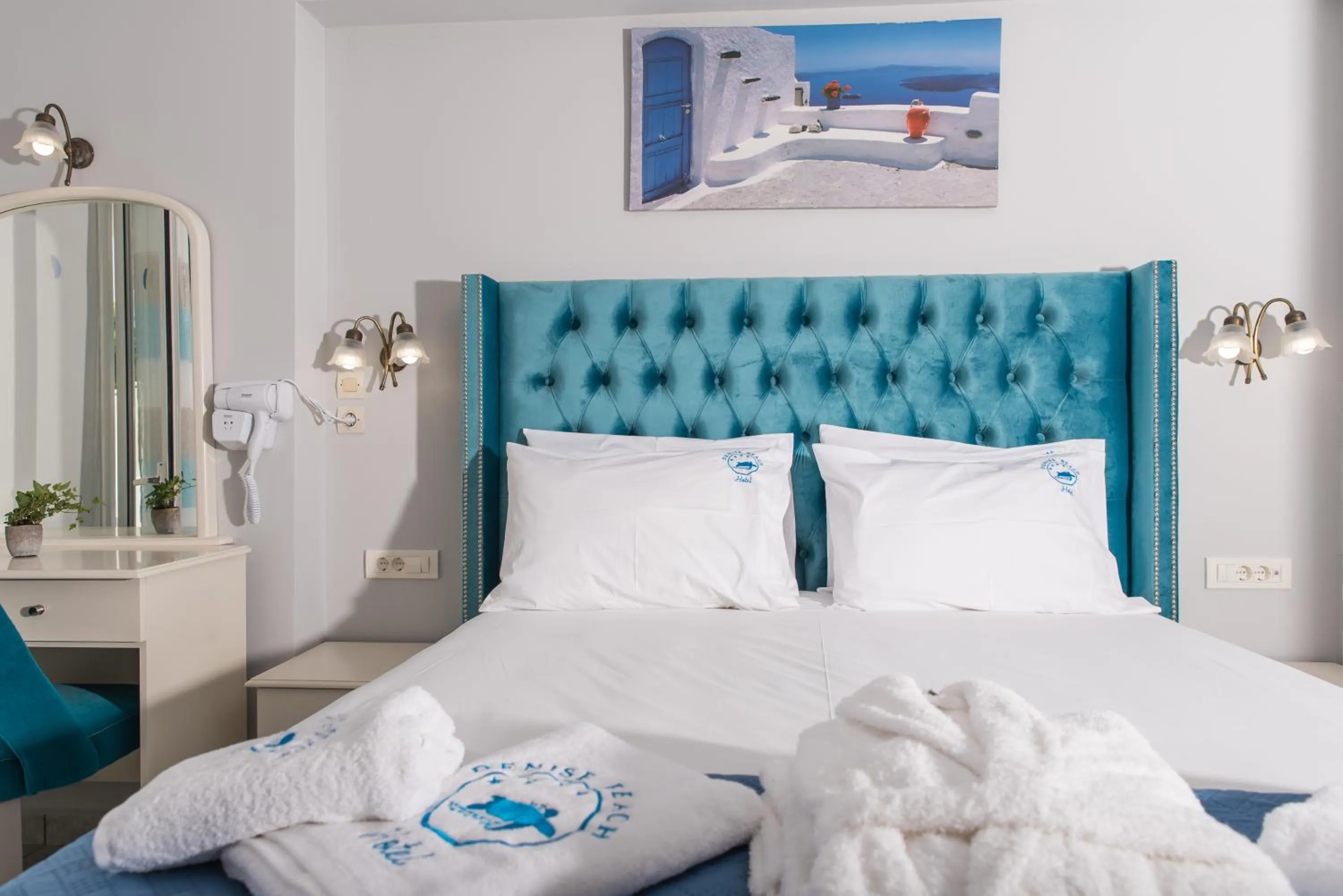 Bed in Denise Beach Hotel