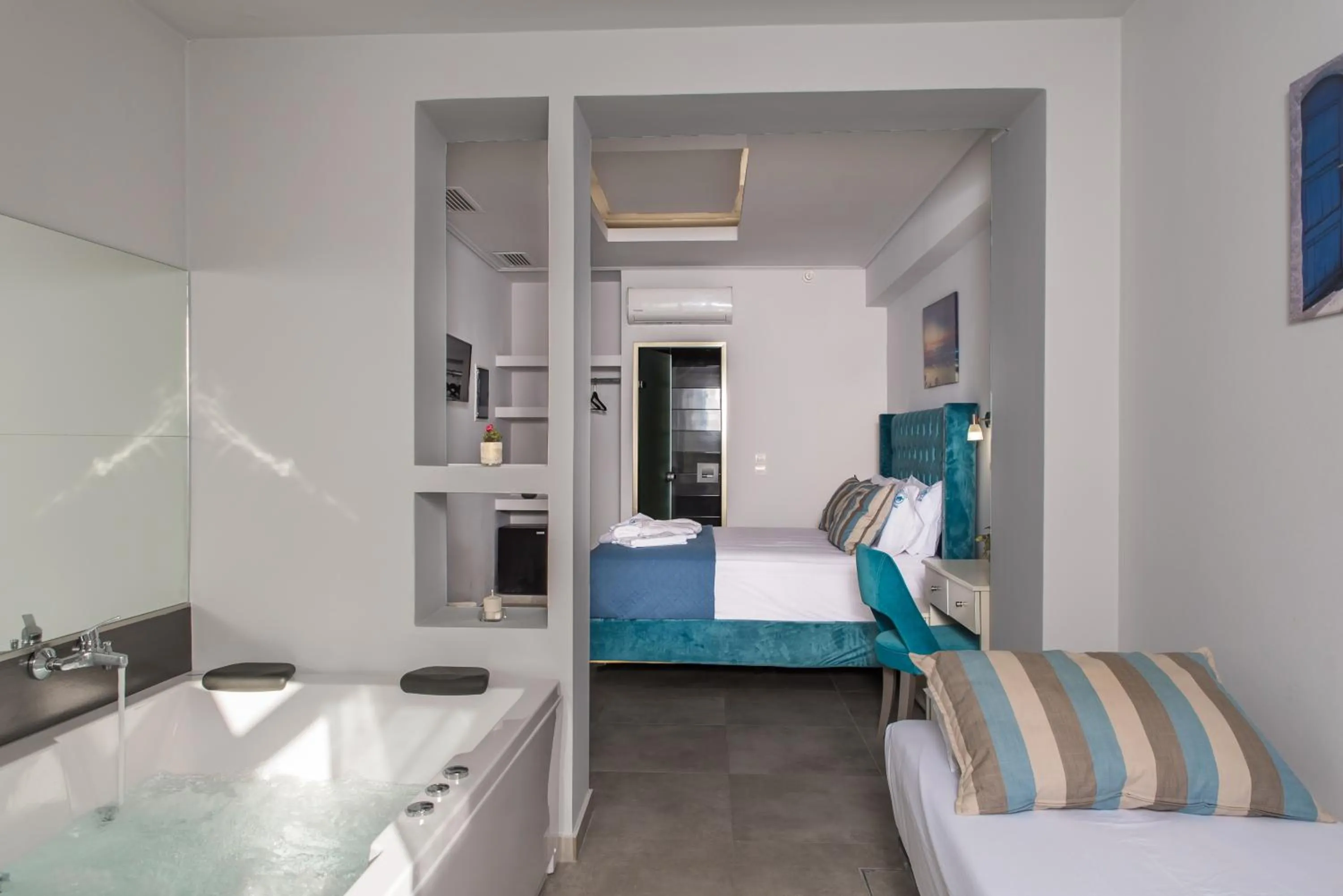 Bed in Denise Beach Hotel