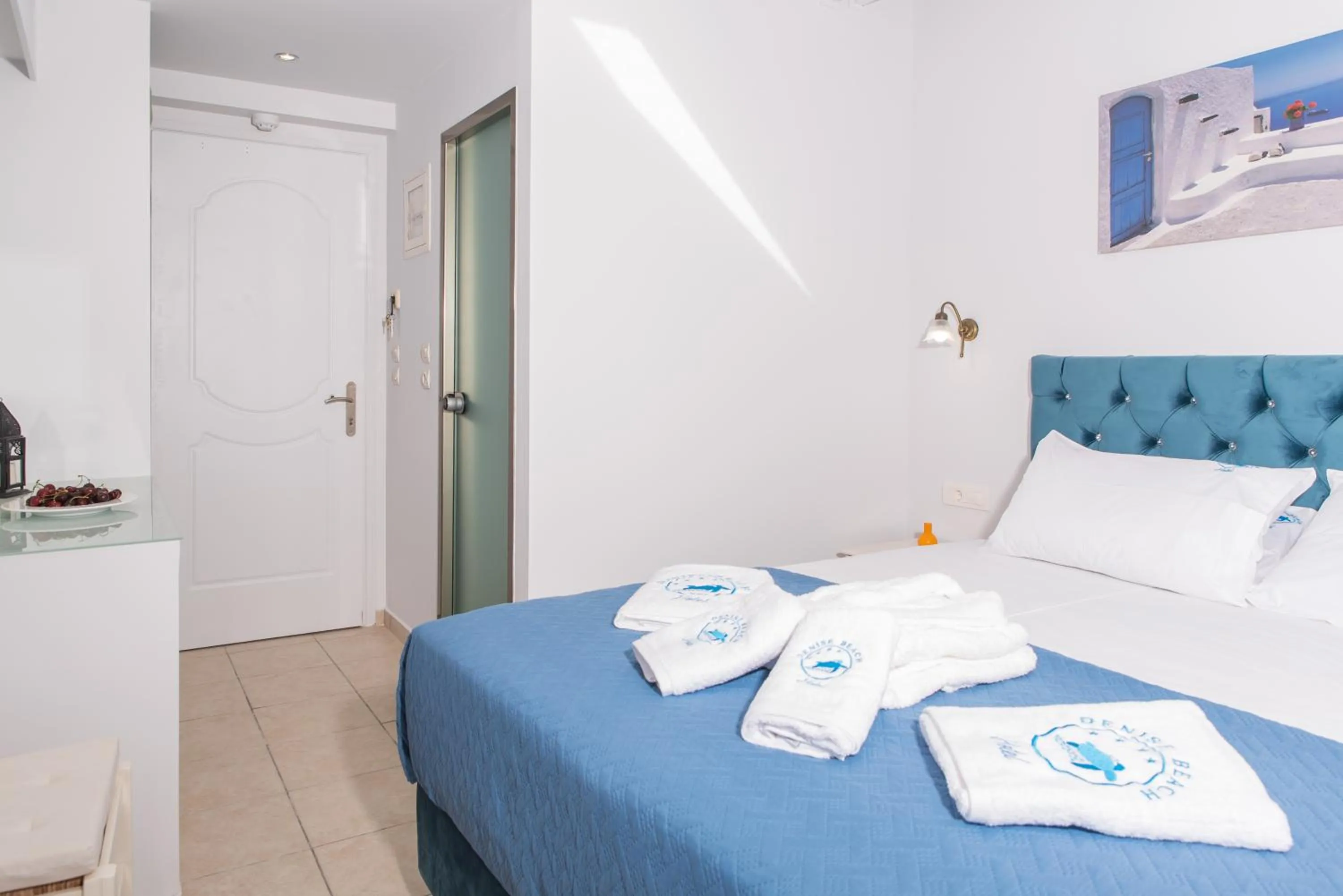 Bed in Denise Beach Hotel