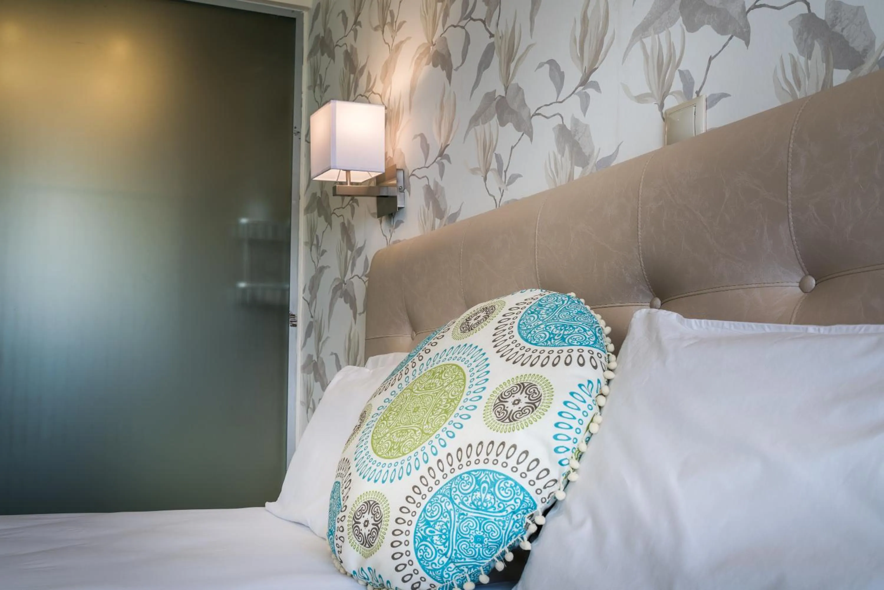 Bed in Denise Beach Hotel