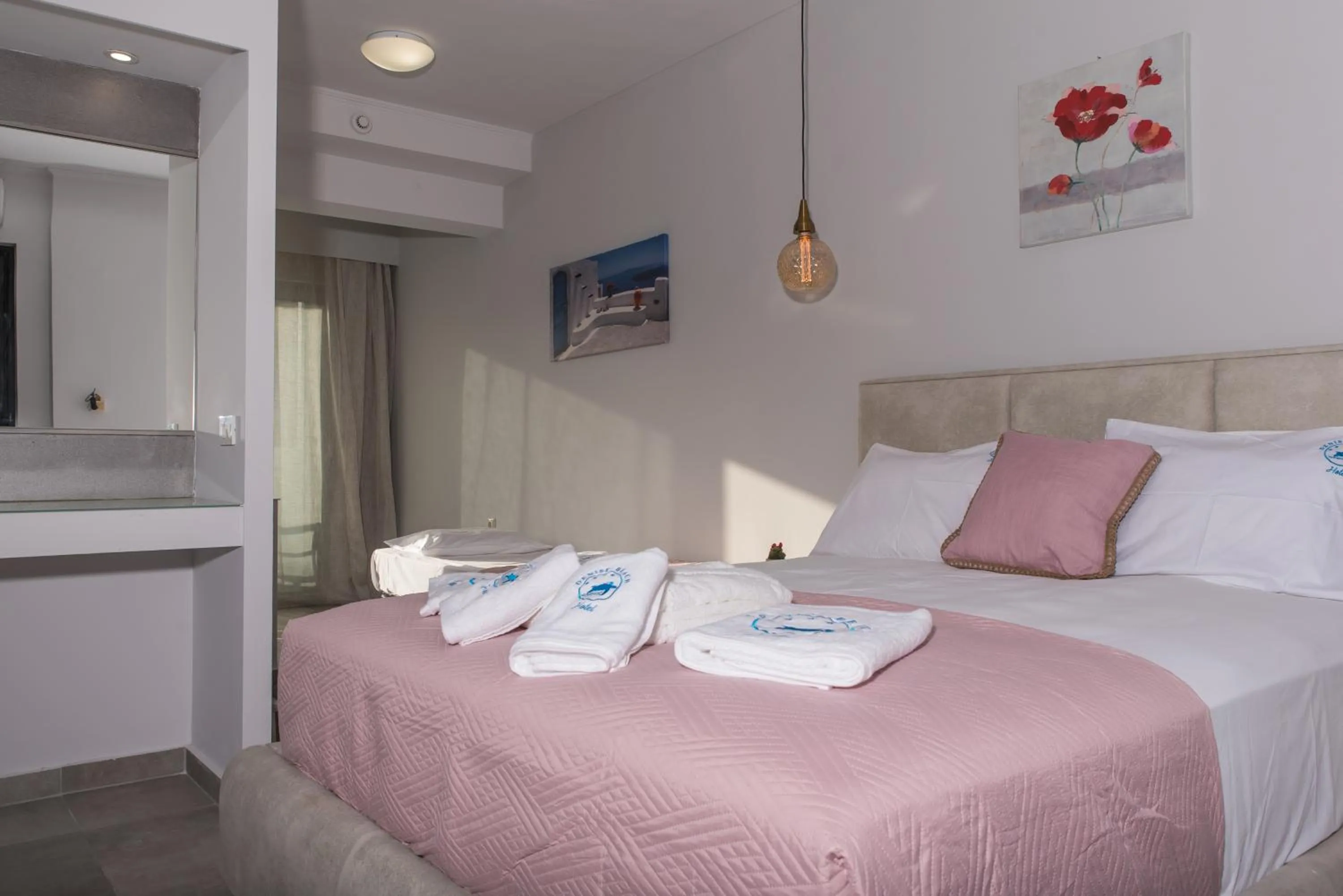 Bed in Denise Beach Hotel