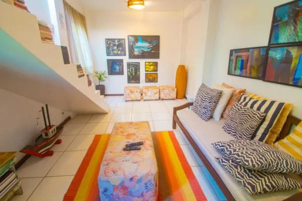 Communal lounge/ TV room in Pousada Portal da Concha