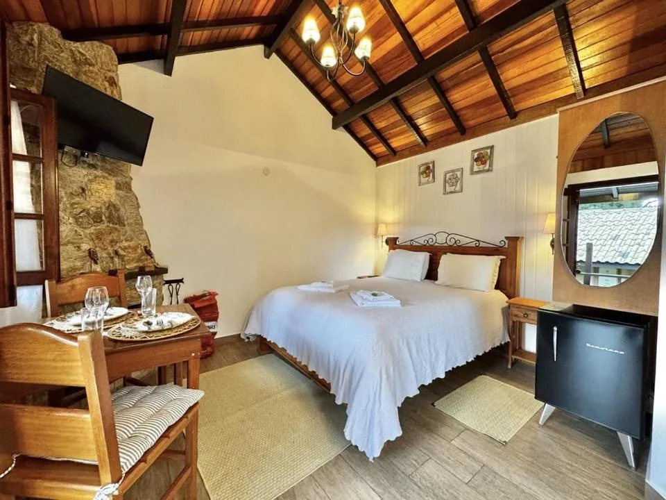 Bed in Pousada Alto de Monte Verde