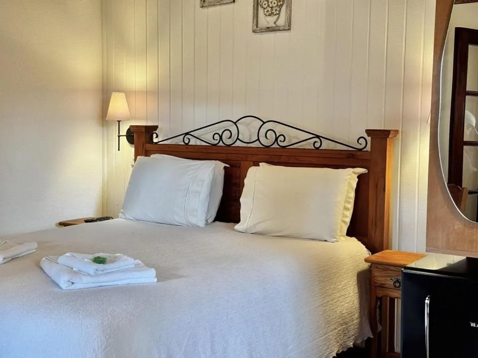 Bed in Pousada Alto de Monte Verde