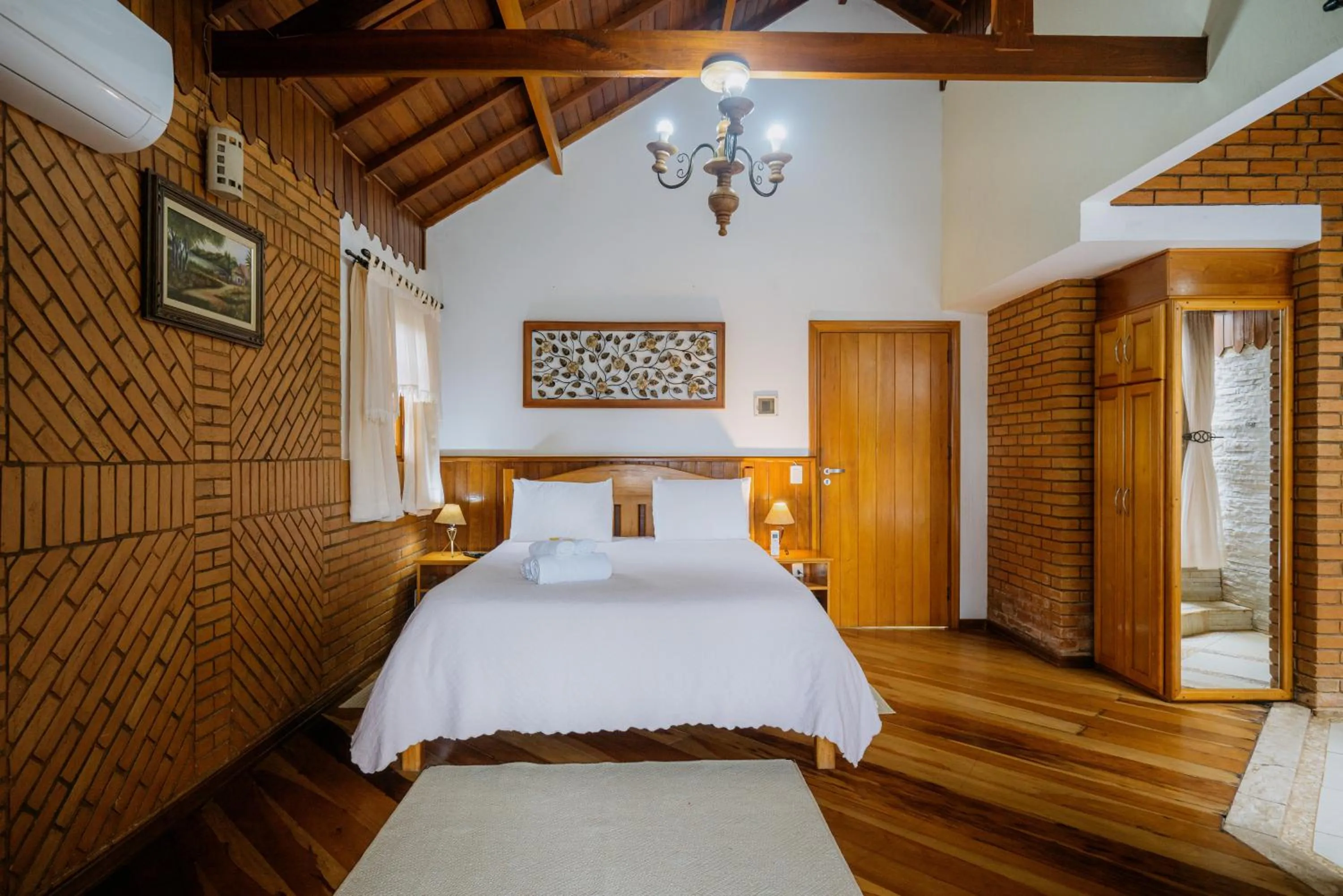 Bed in Pousada Alto de Monte Verde