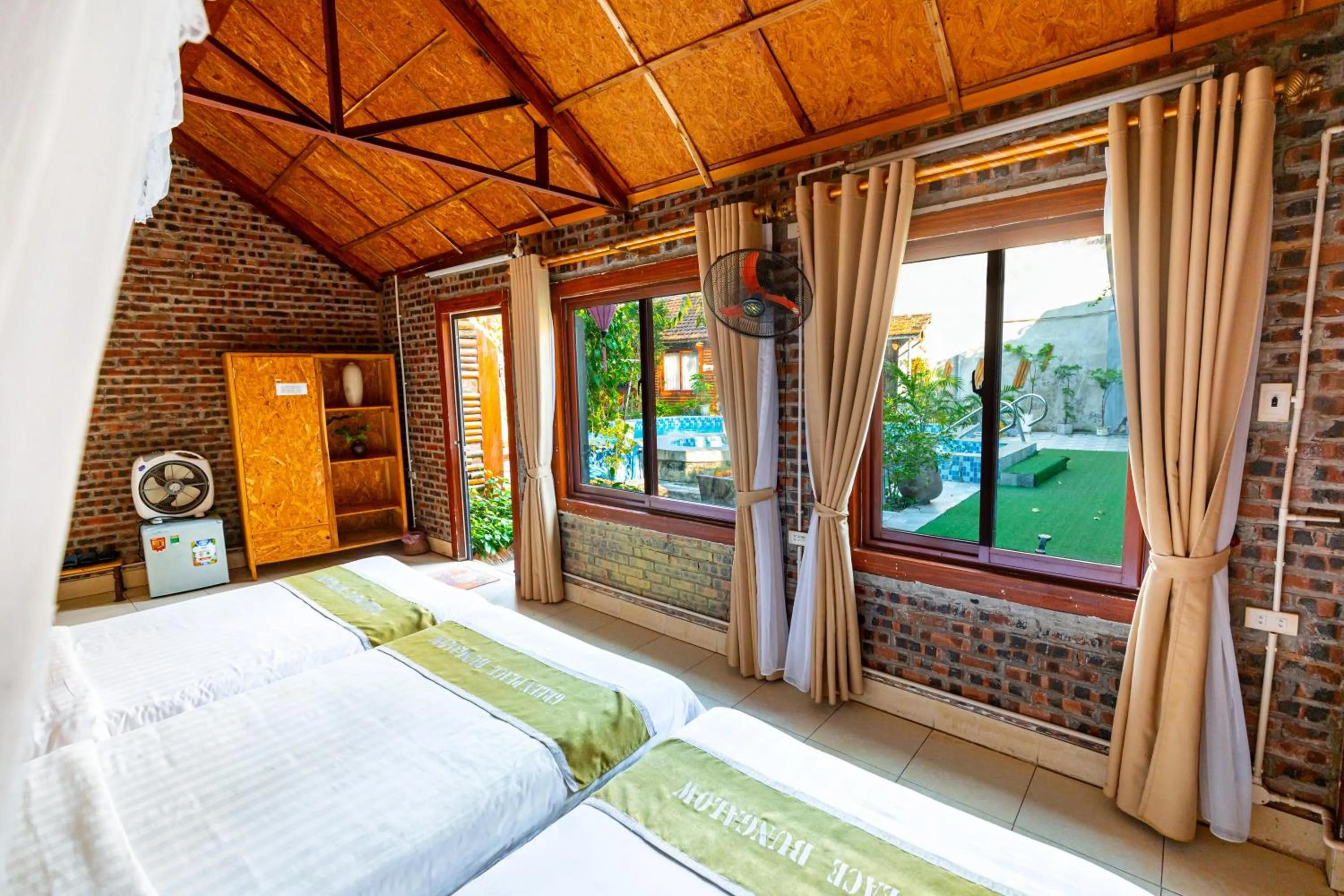 Bed in Green Peace Bungalow