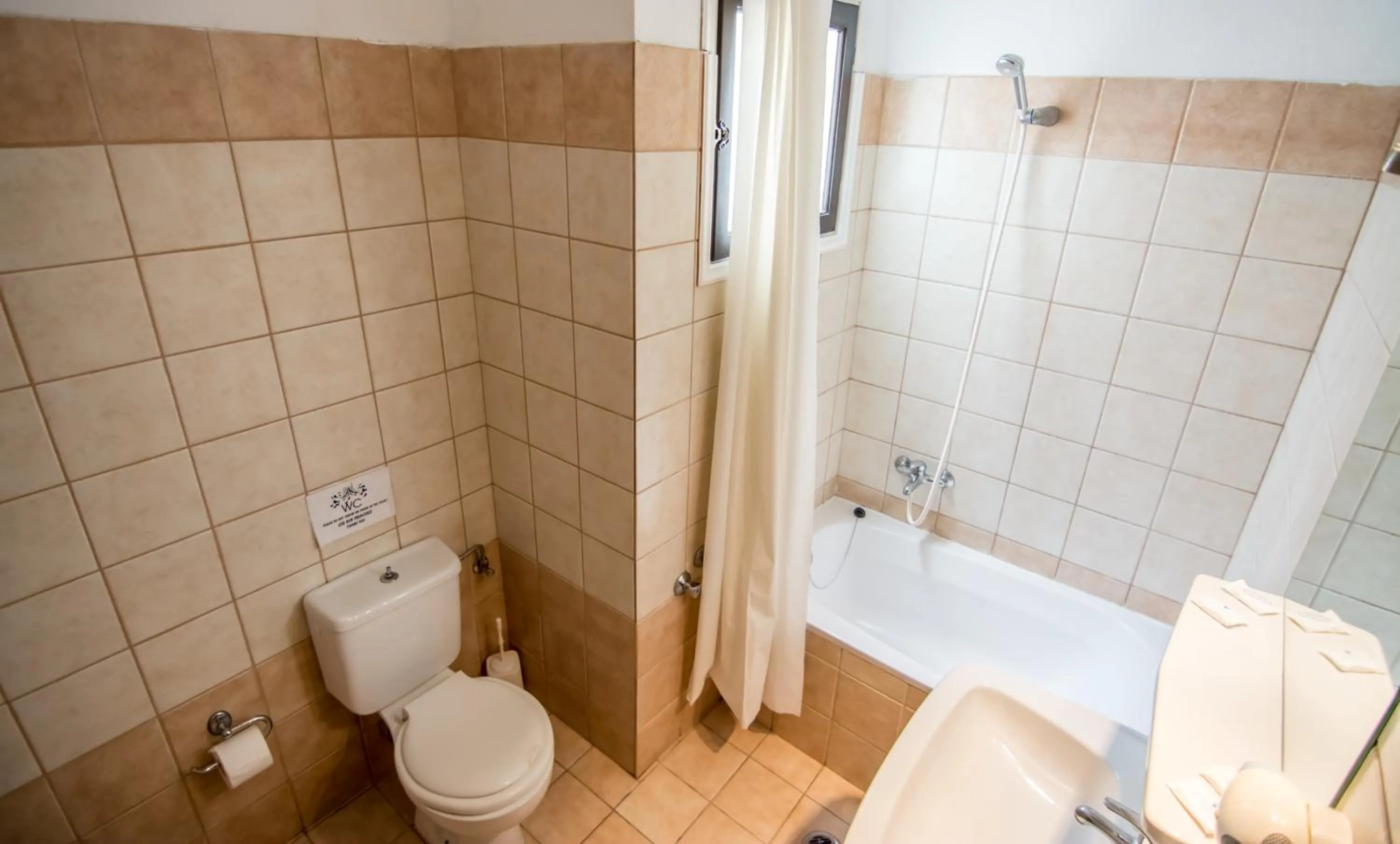 Bathroom in Annaliza Apartments