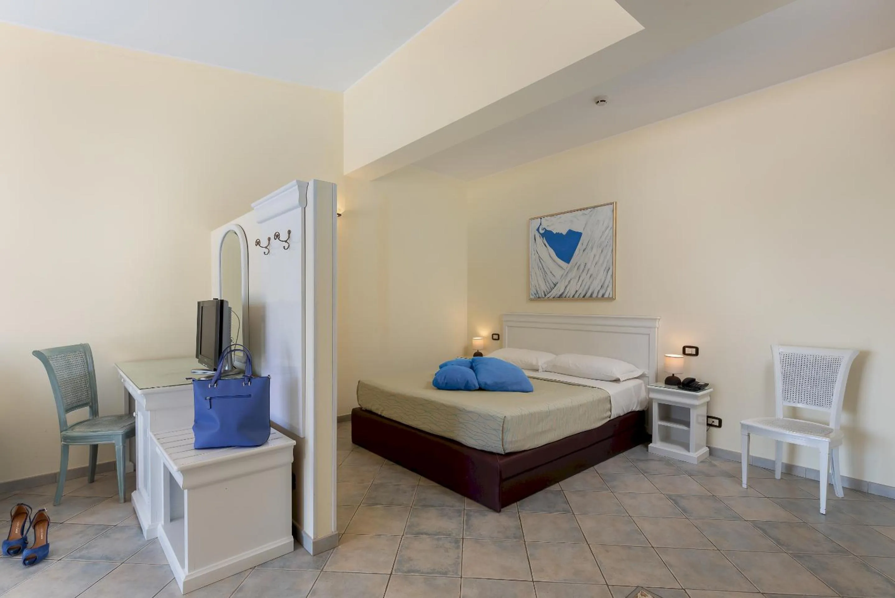 Bed in Hotel Riviera