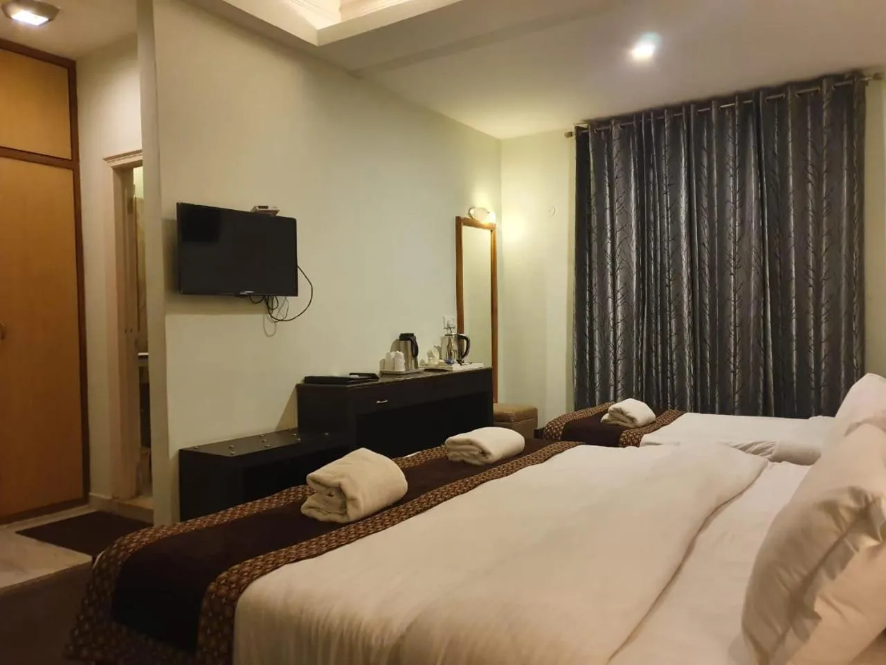 Bed in Hotel Corbett Kingdom