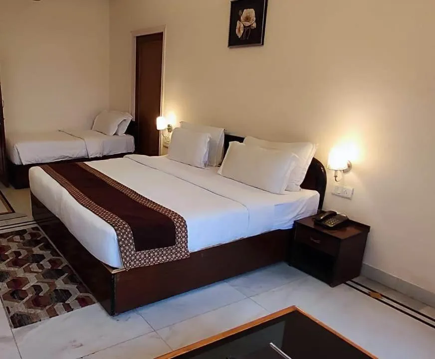 Bed in Hotel Corbett Kingdom