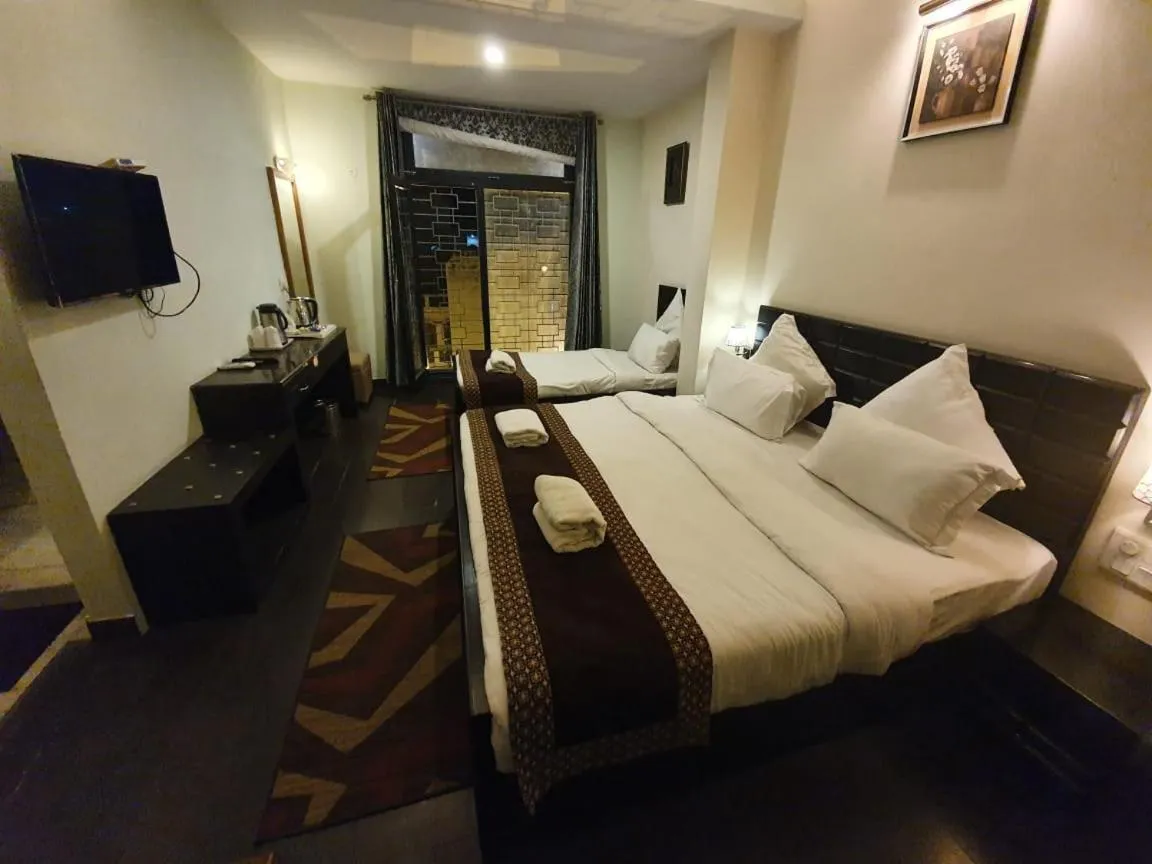 Bed in Hotel Corbett Kingdom