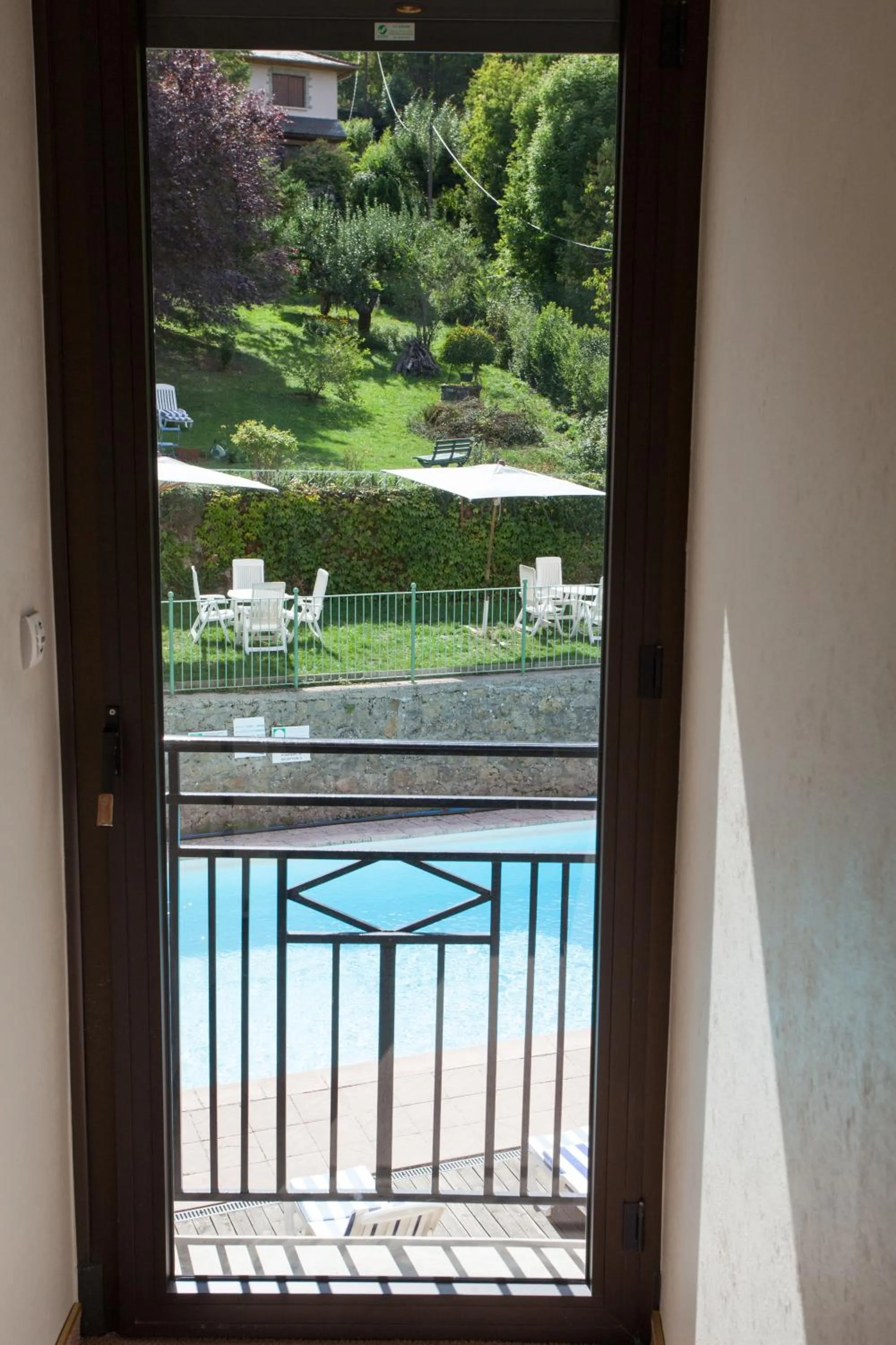 Bed in Logis Hôtel Restaurant Le Mont Aigoual