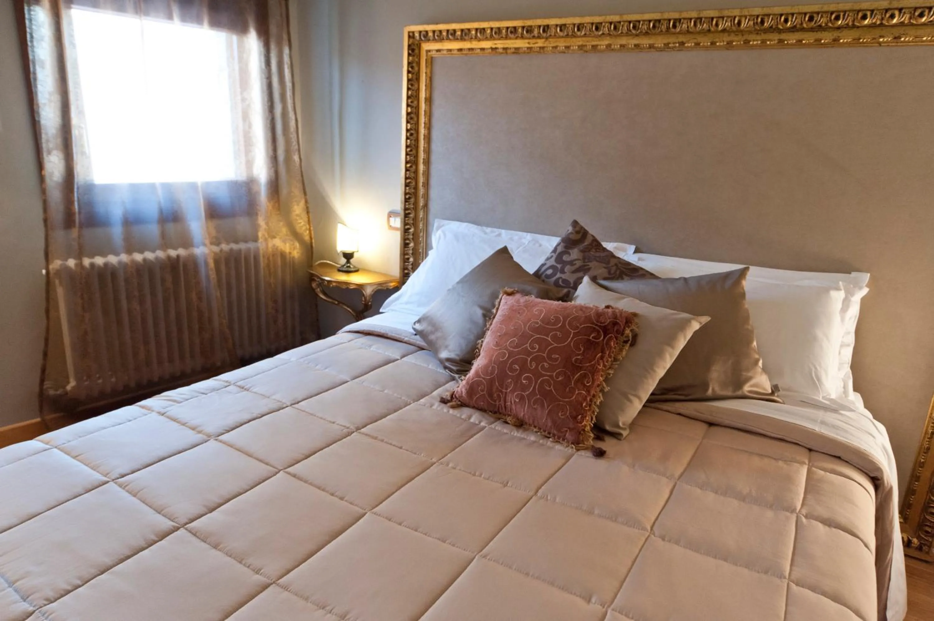 Decorative detail, Bed in Casanova Penthouse in the heart of Venice