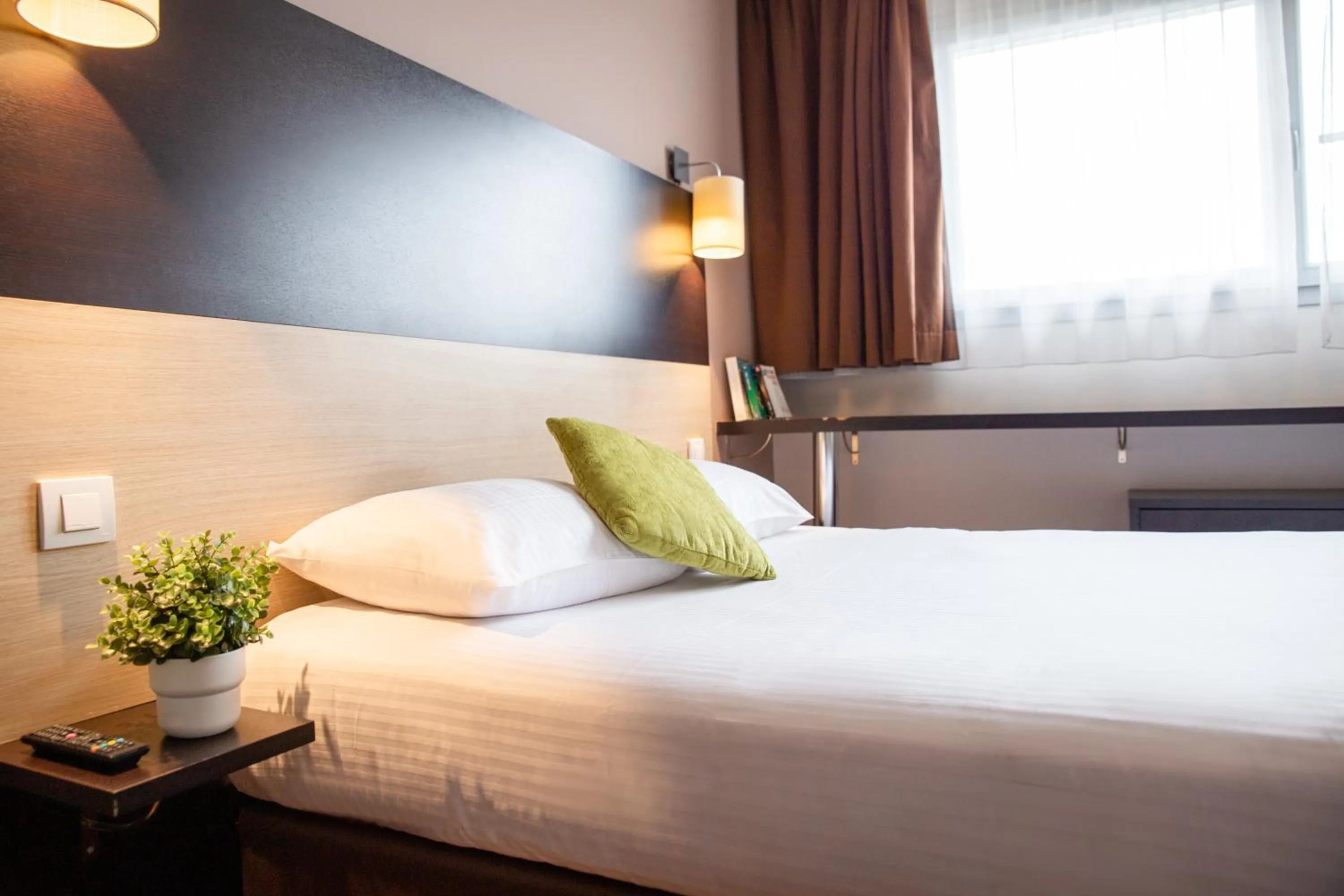 Bed in Clarion Aparthotel Toulouse Le Parc de l'Escale